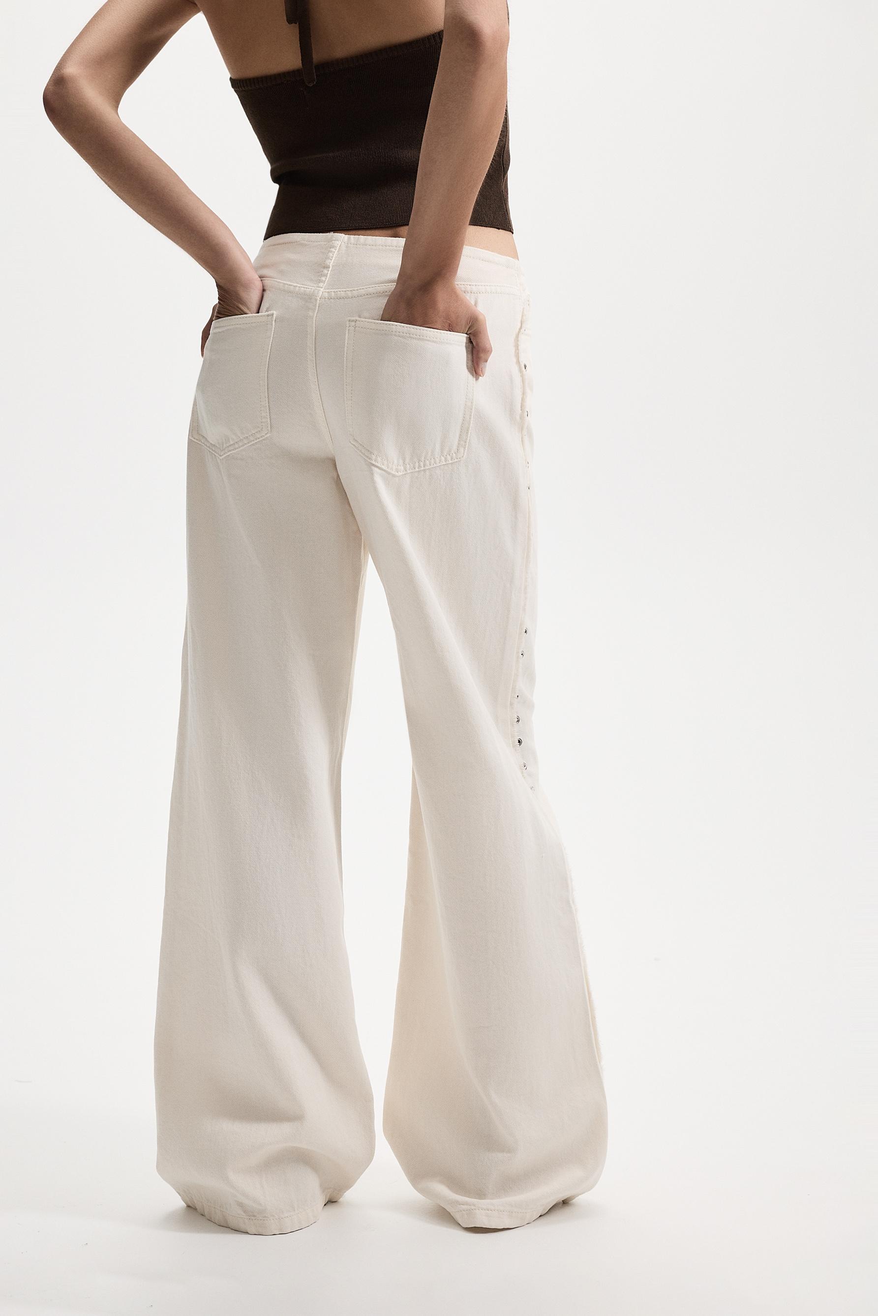 Wide-leg eyelet jeans — OFF WHITE
