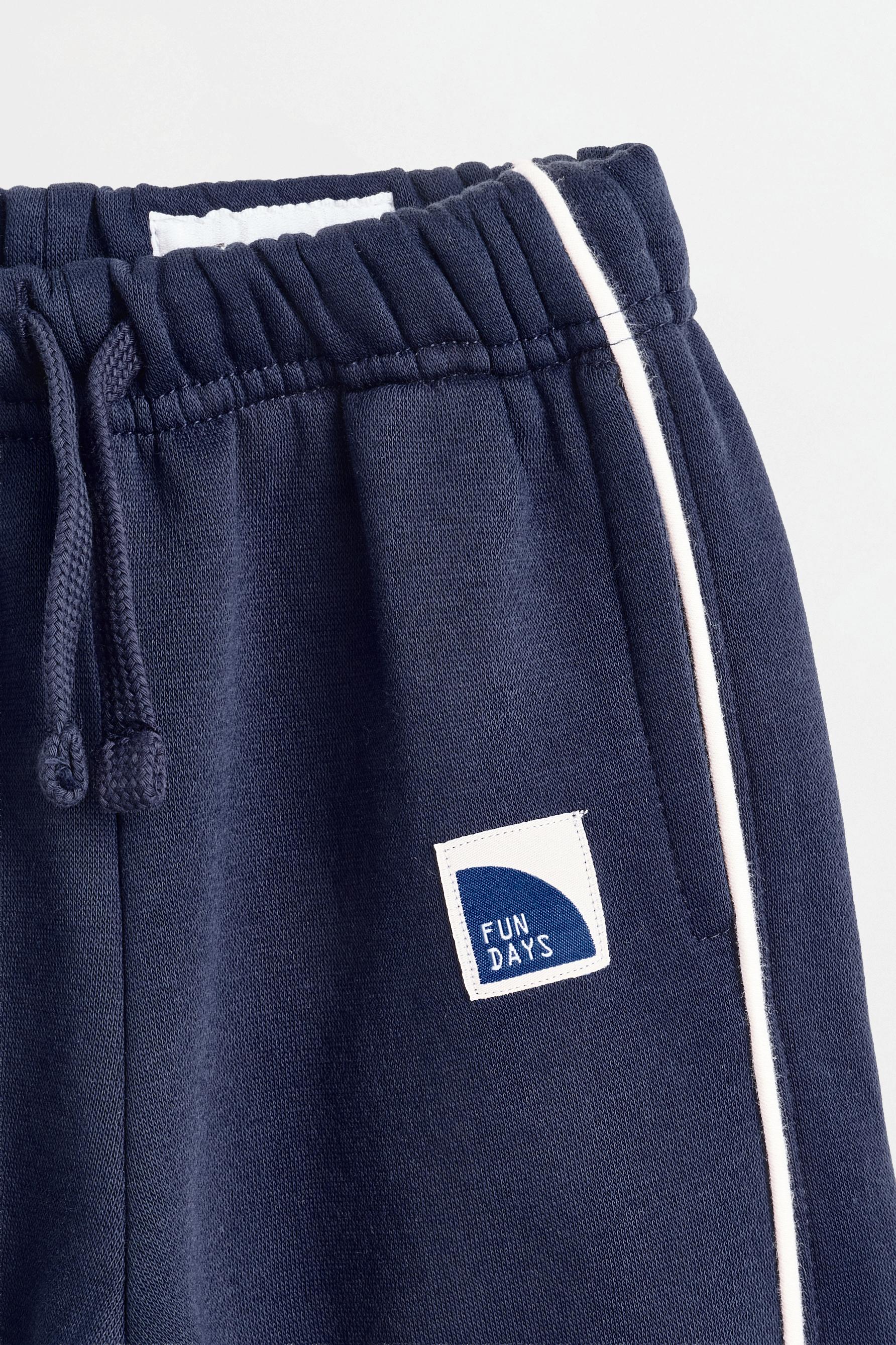 Plush trousers with piping — NAVY
