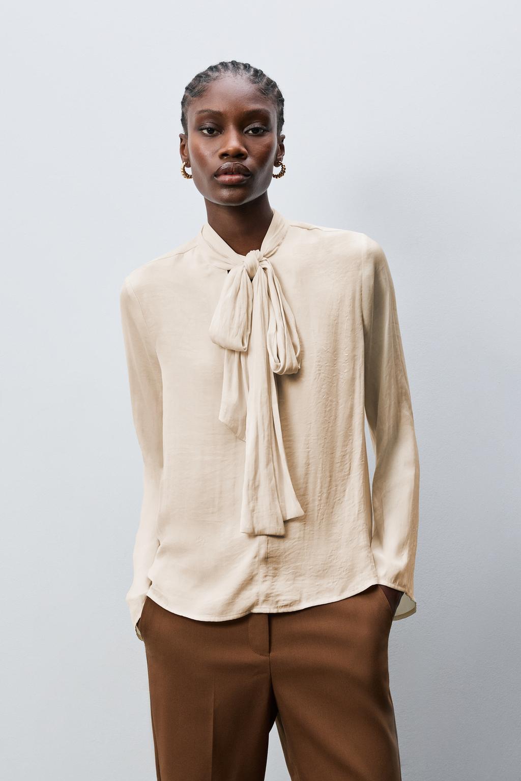 Camisa setinada amb llaç