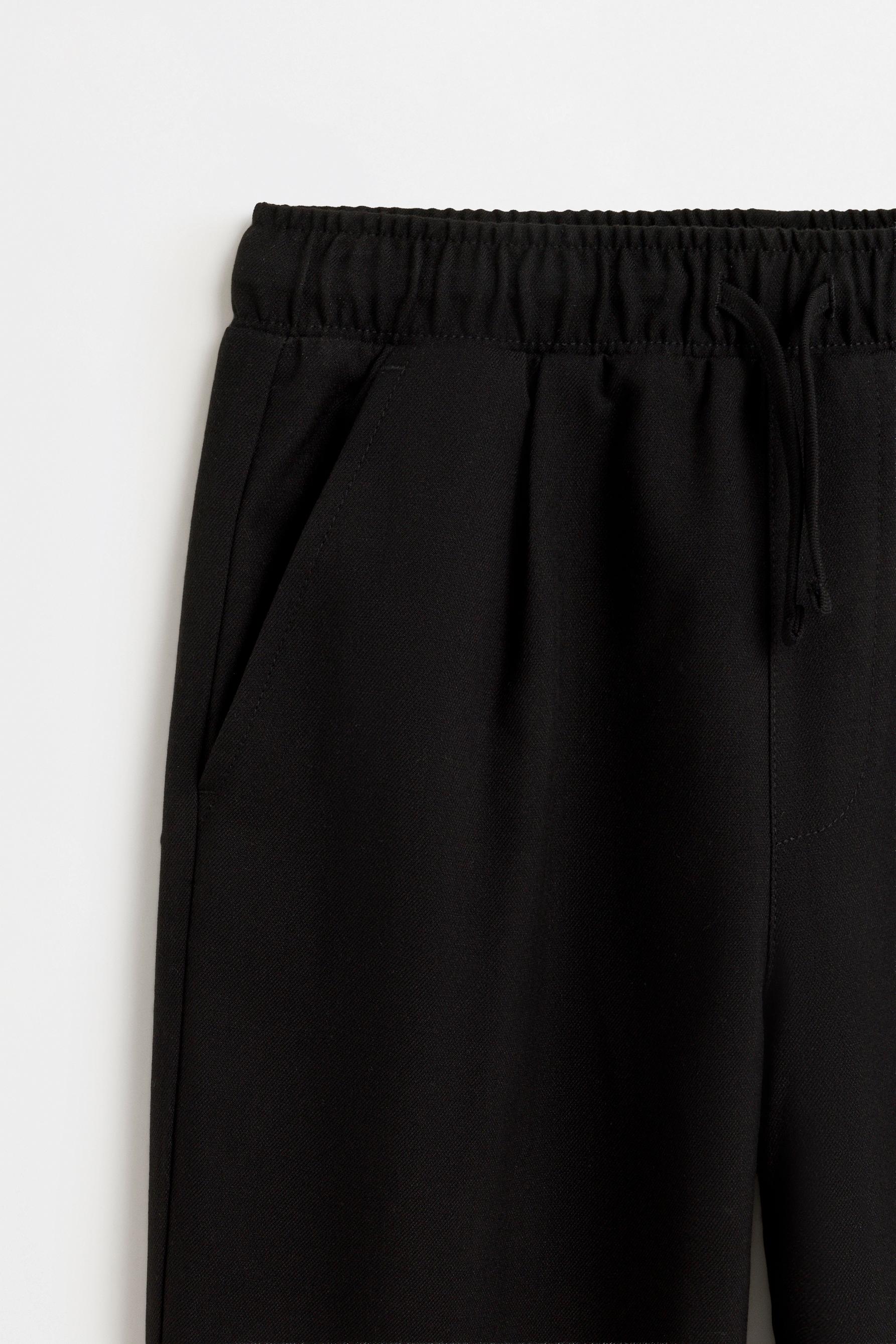 Tailored fit trousers — BLACK