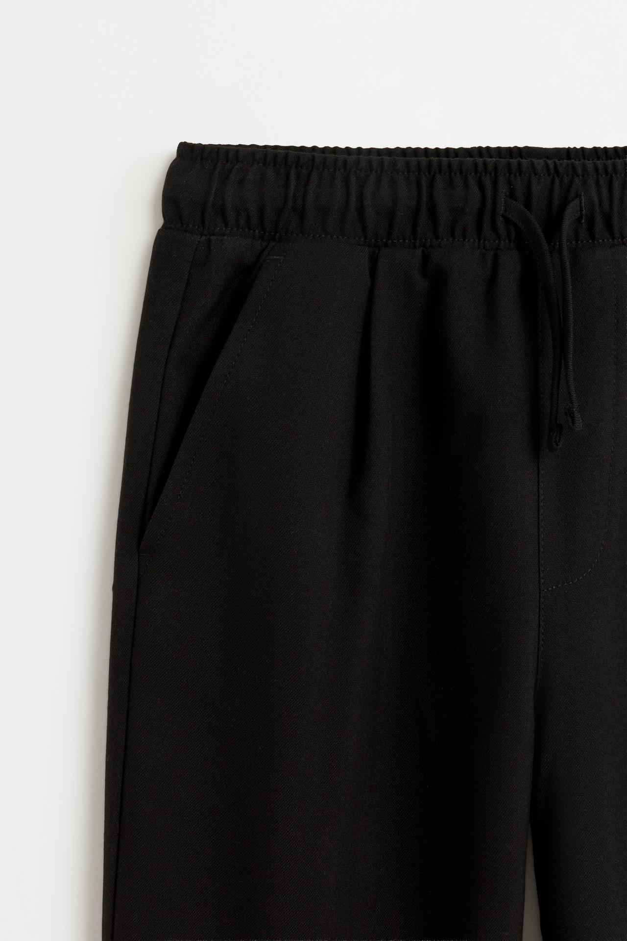 Tailored fit trousers — BLACK
