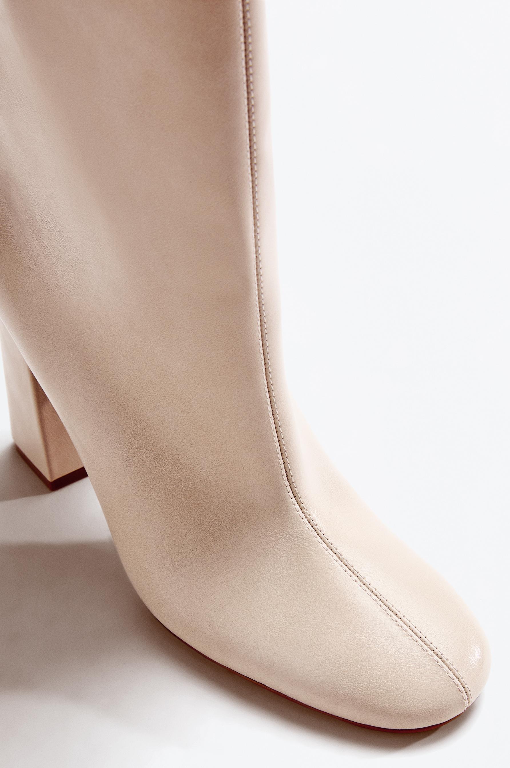Knee-high heeled boots — ECRU