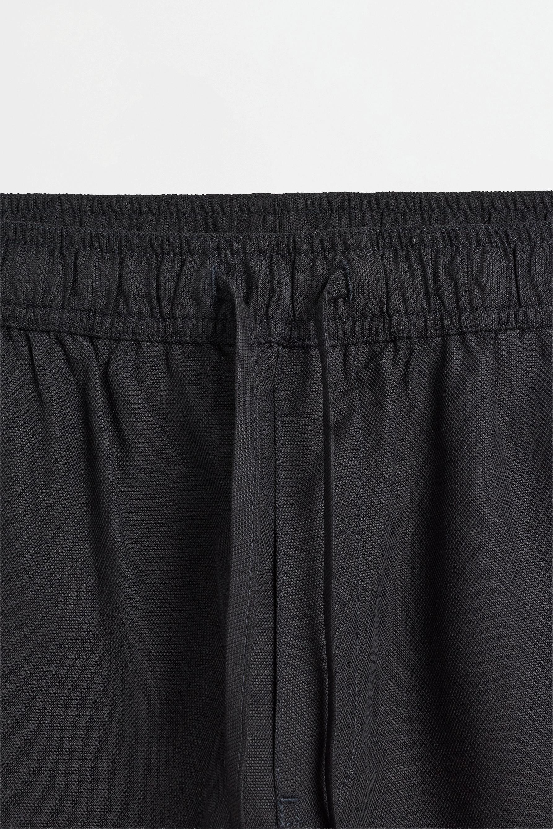 Flowing wide-leg joggers — BLACK