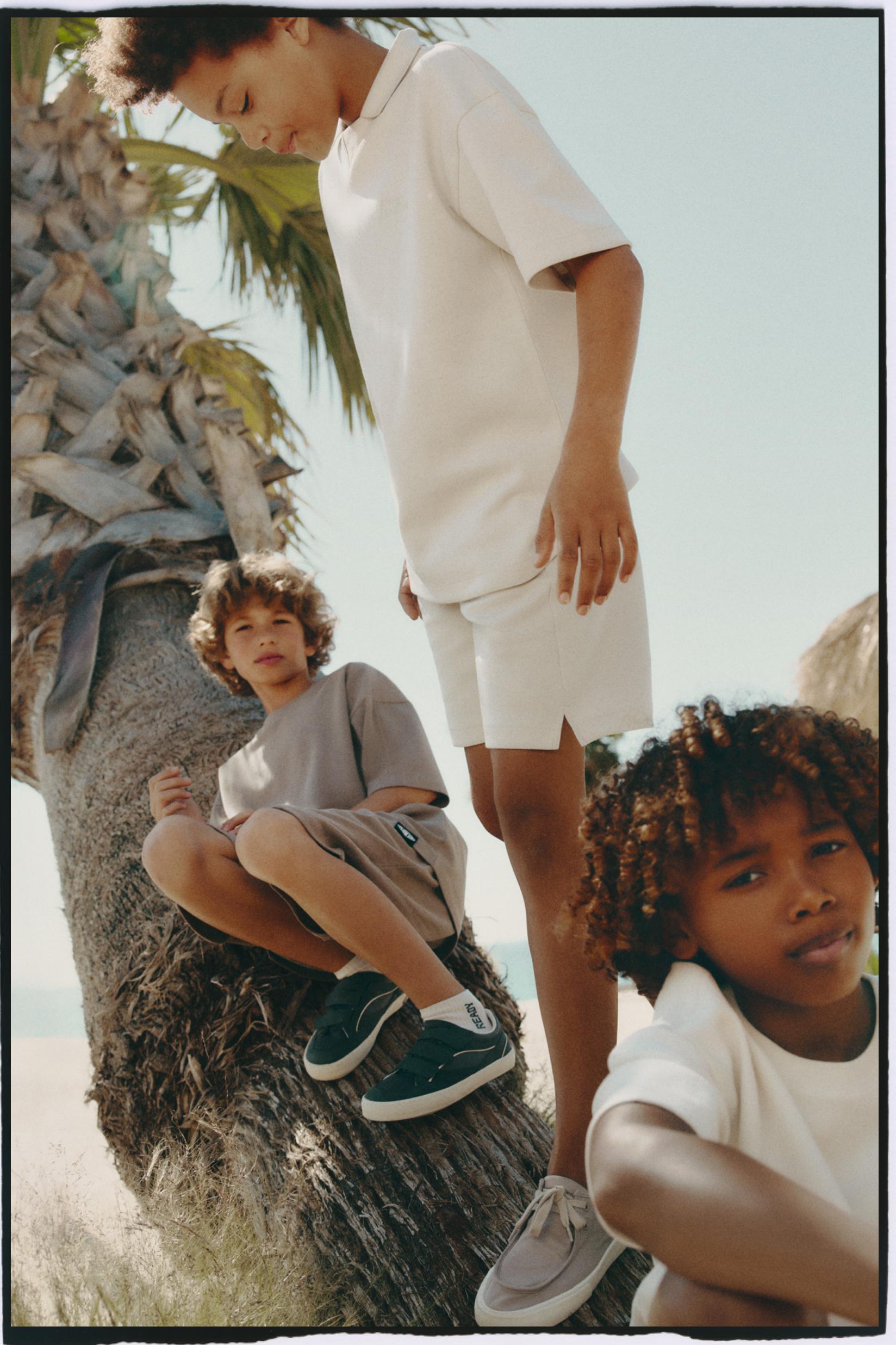 Interlock polo shirt with text — ECRU