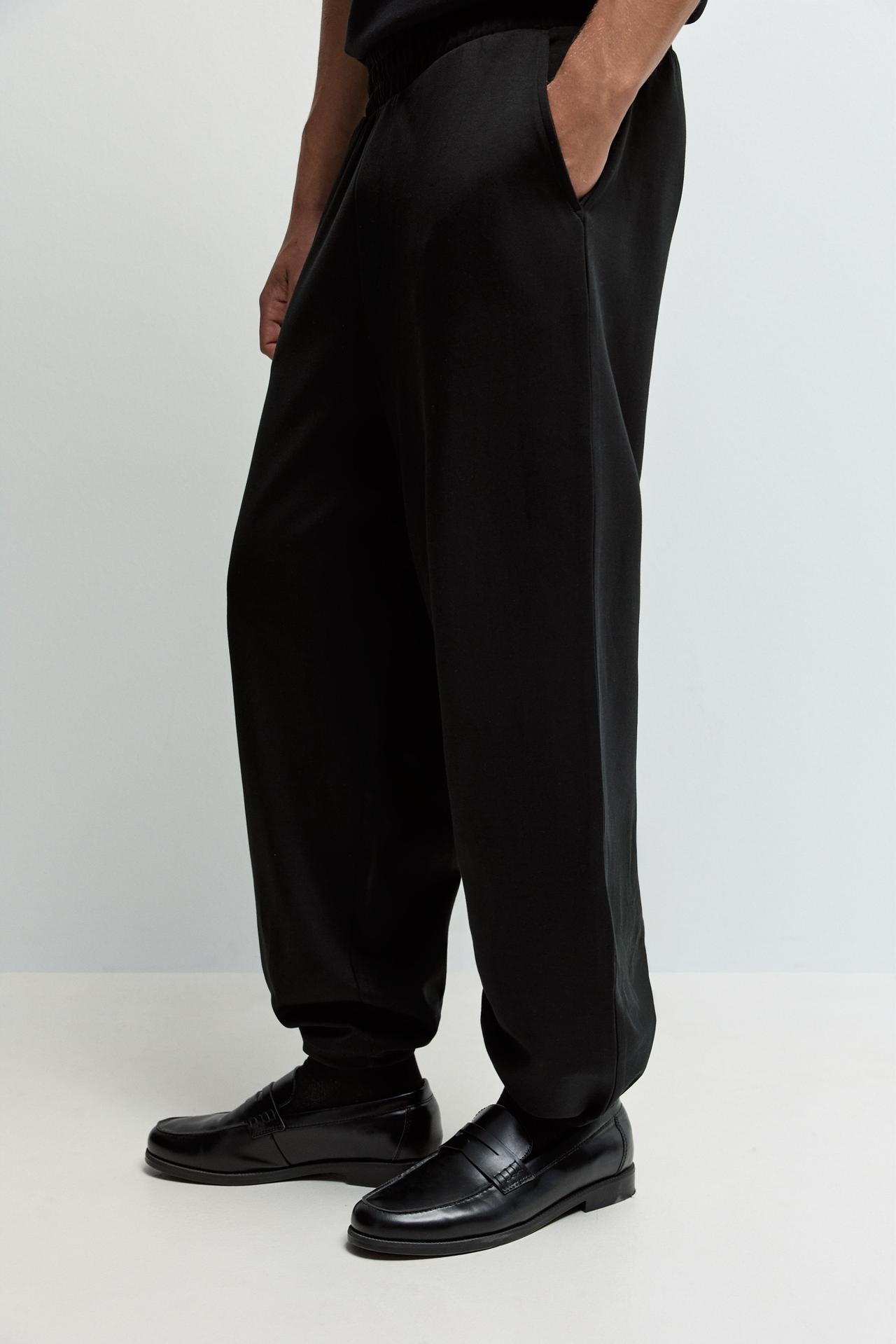 Interlock baggy trousers — BLACK