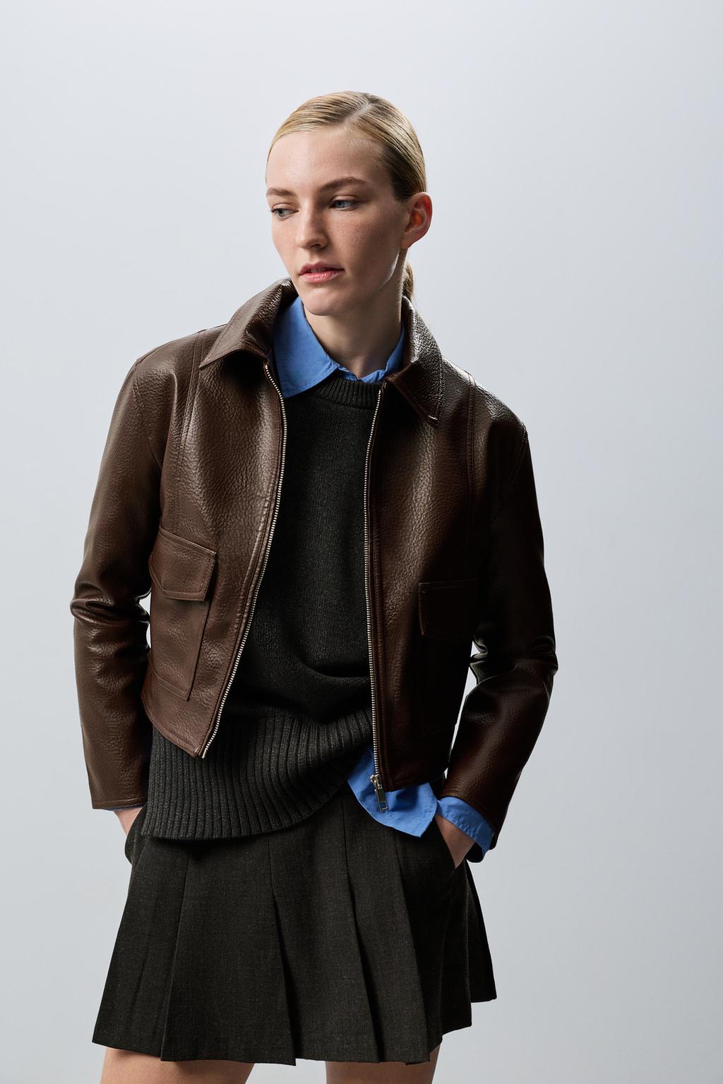 Cazadora efecto piel bolsillos