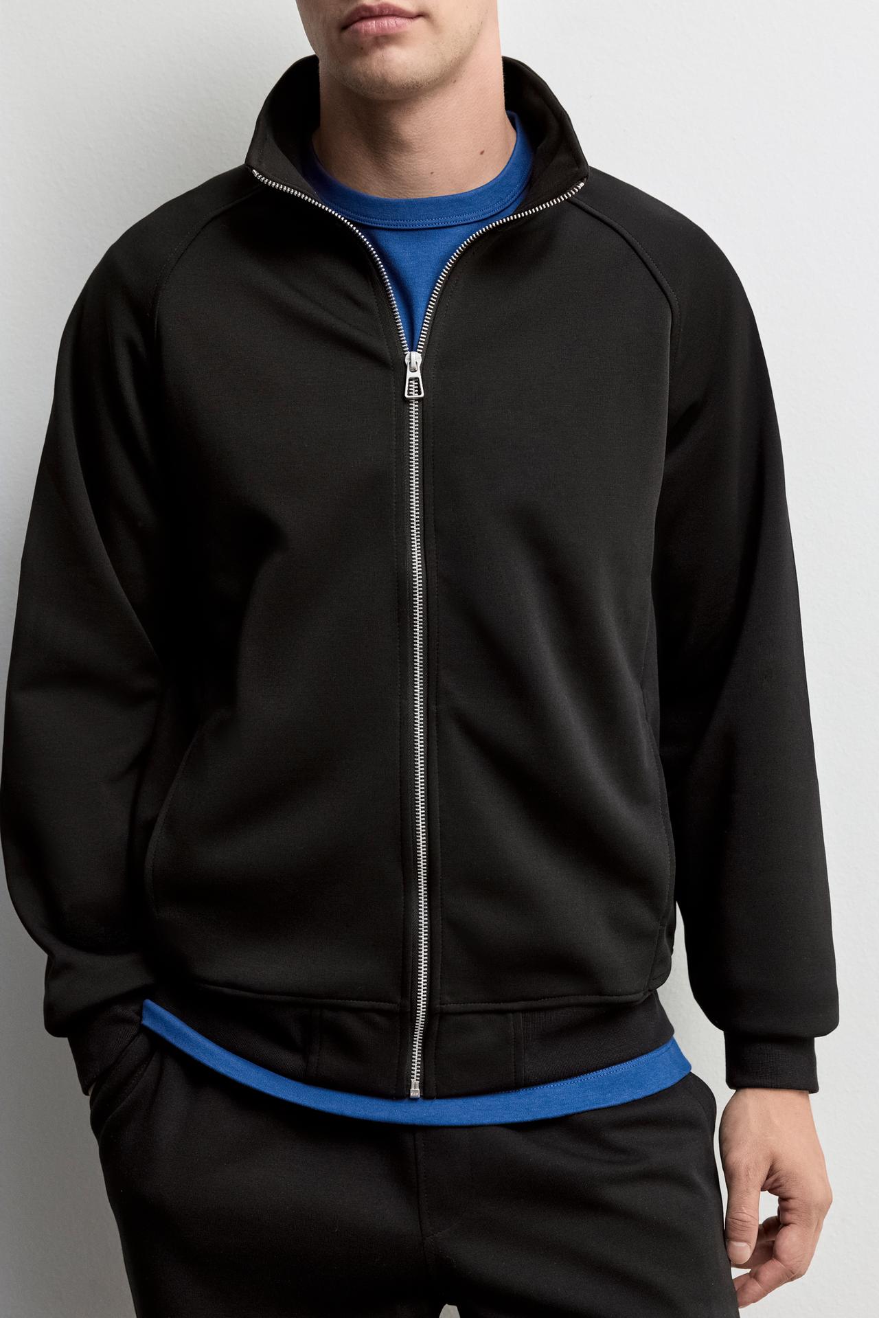 Interlock high-neck jacket — BLACK
