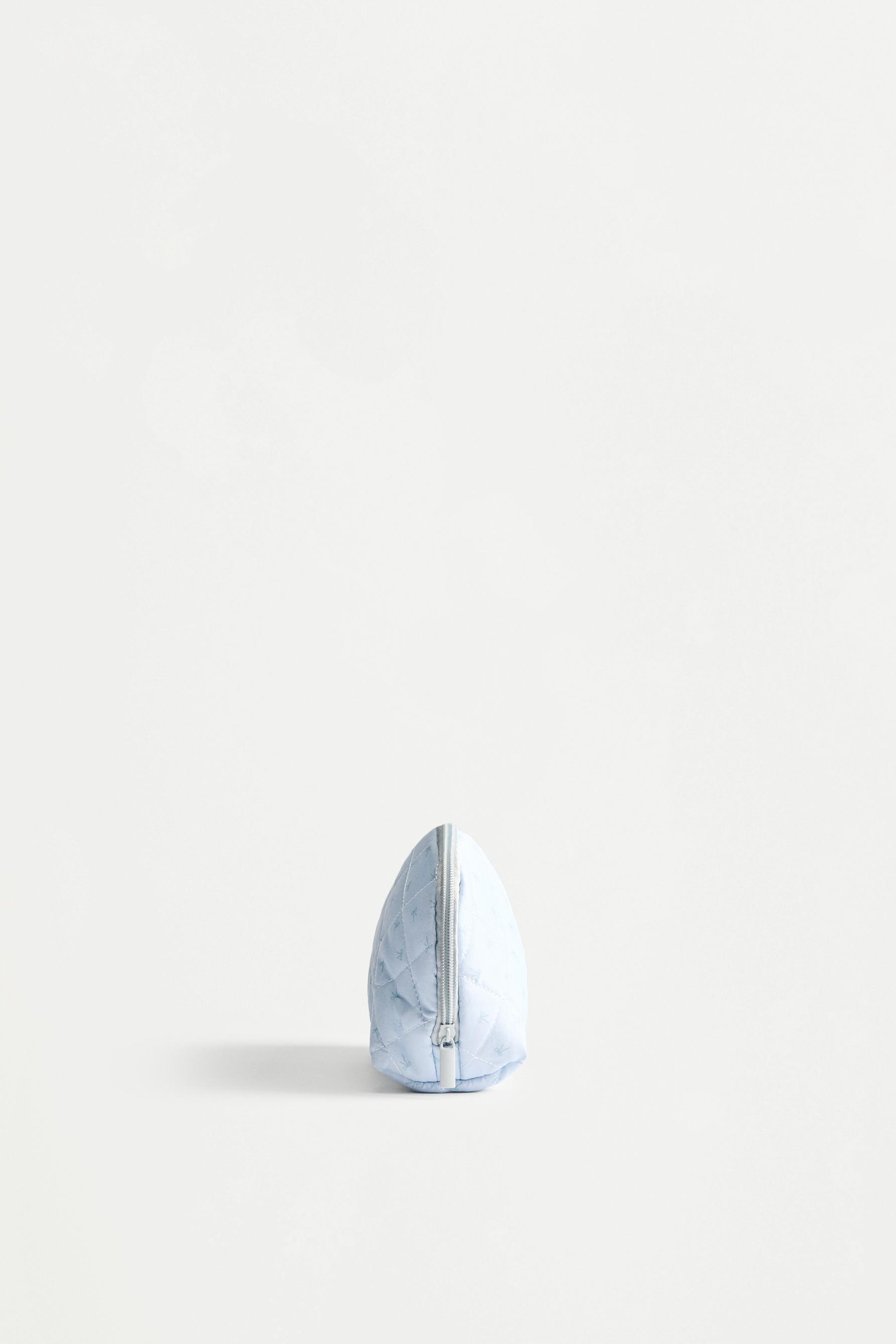 Medium ribbon-print toiletry bag — PASTEL BLUE