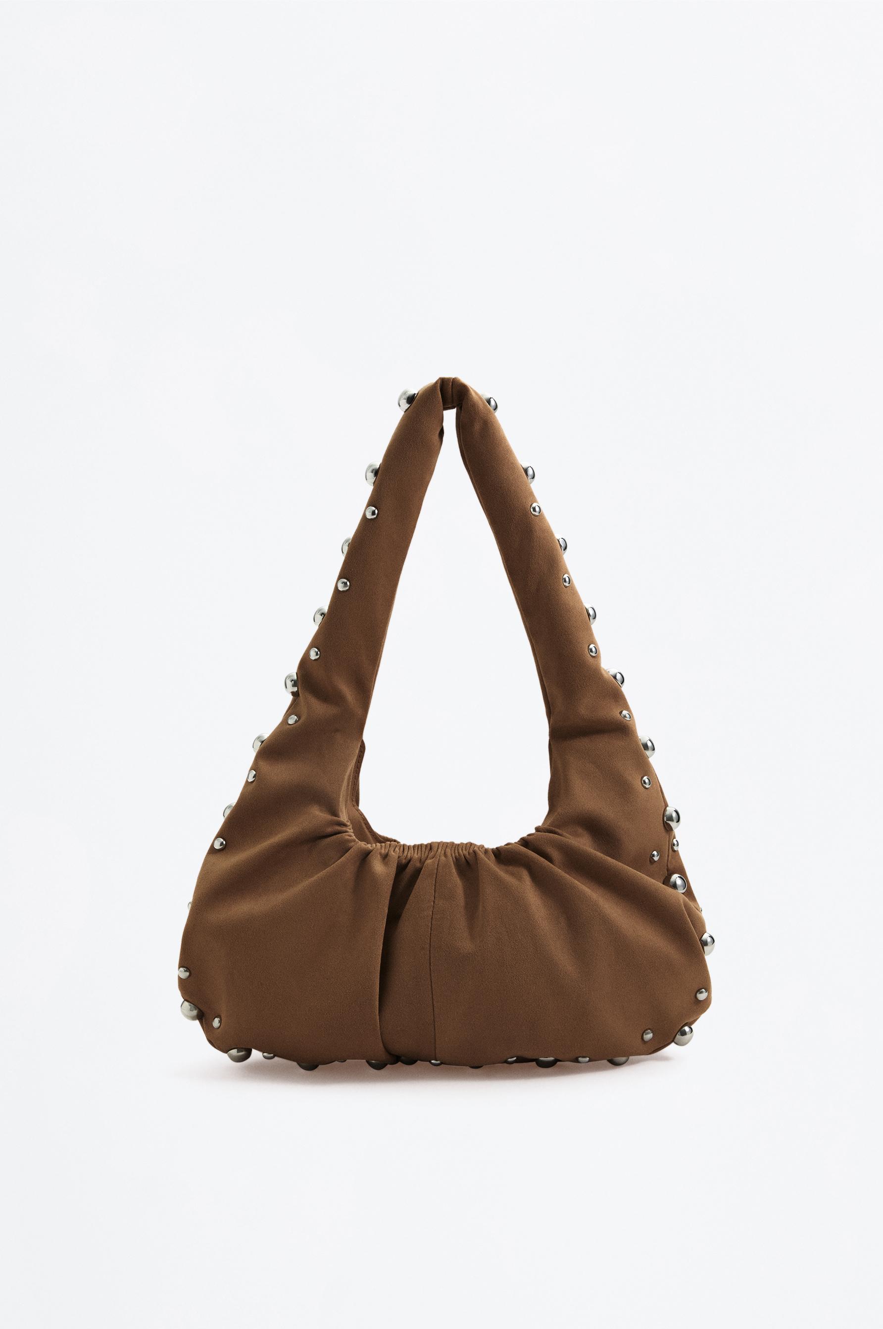 Bolso hombro efecto ante tachas