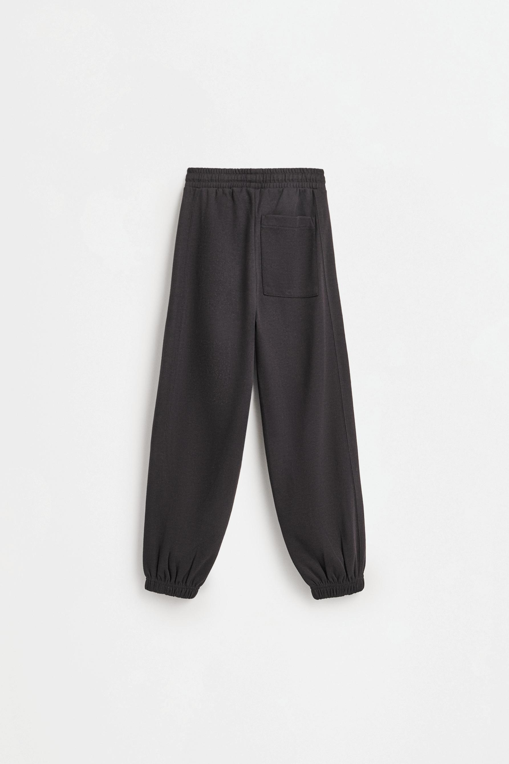 Interlock joggers with contrast piping — BLACK