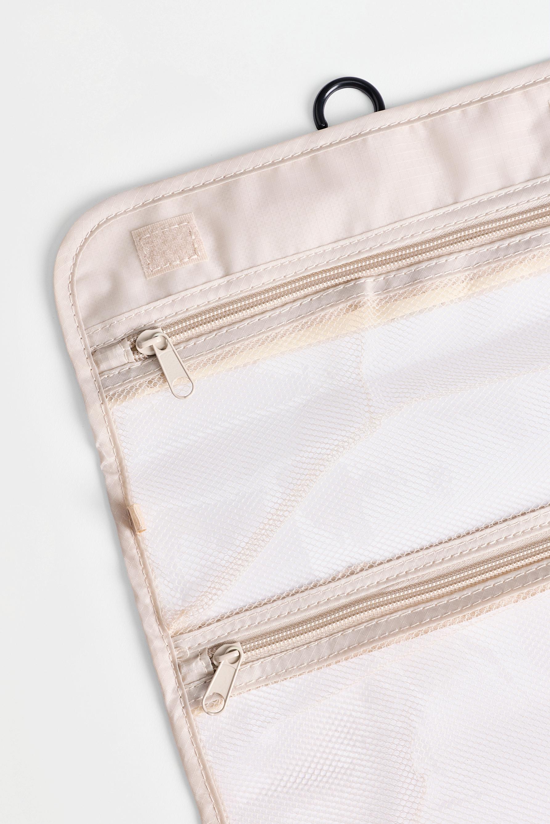 Foldable travel toiletry bag — ECRU