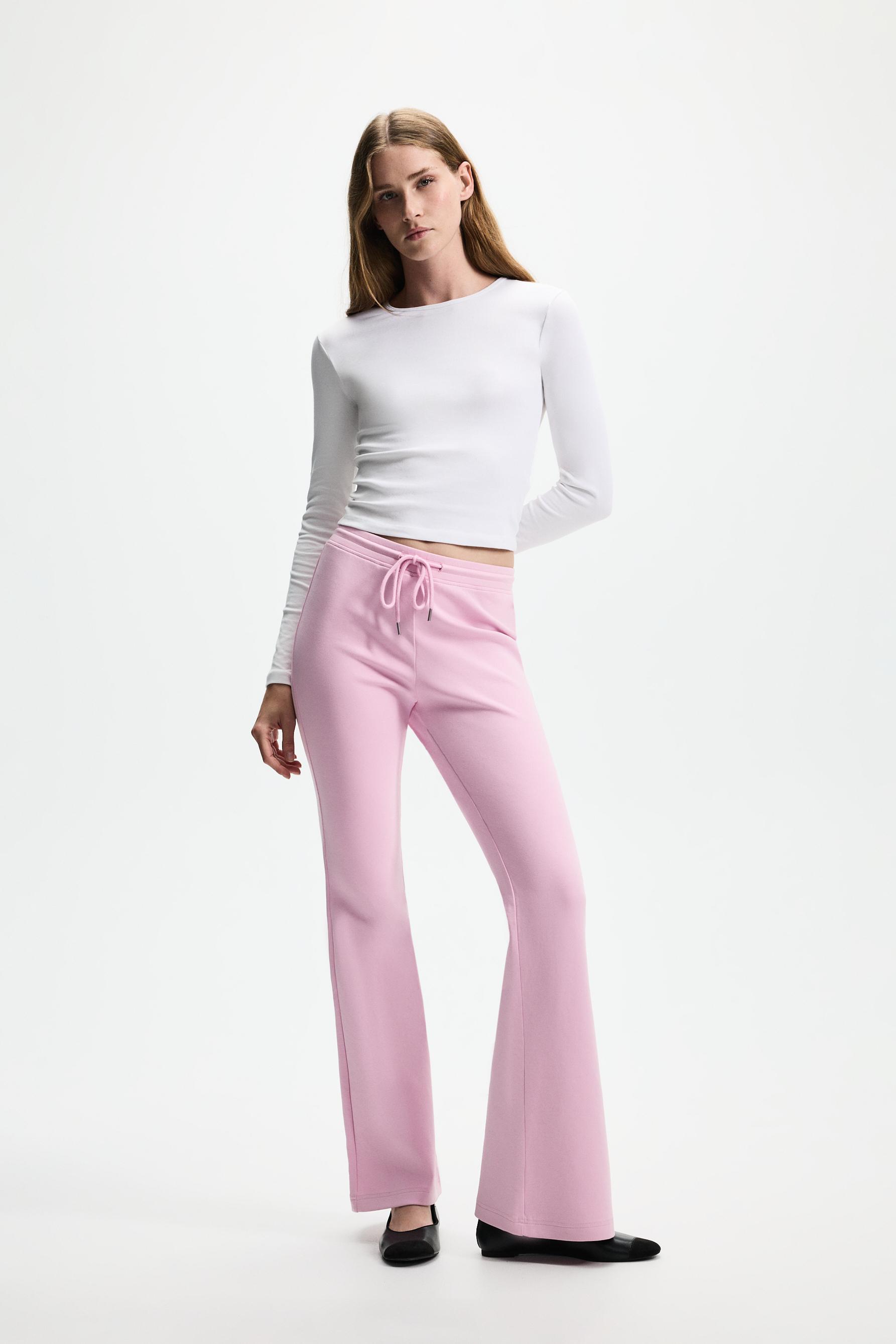 Basic interlock bell bottom trousers — PASTEL PINK