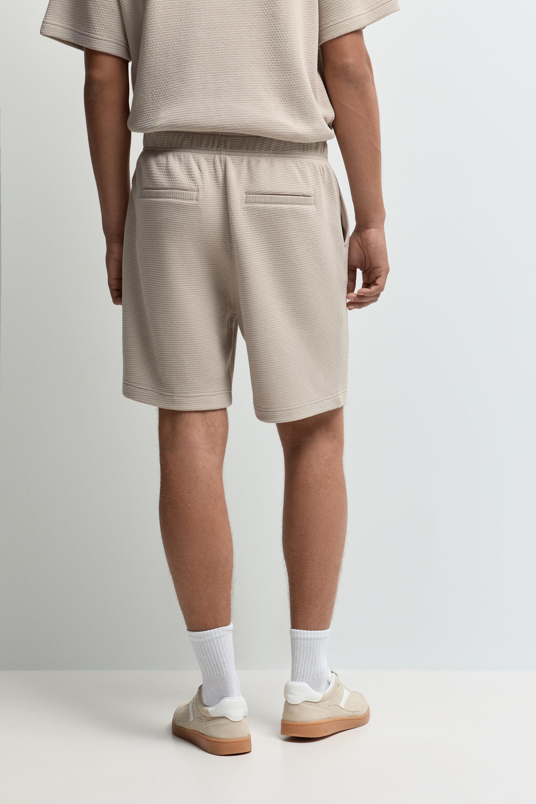 Waffle-textured Bermuda shorts — PALE SAND