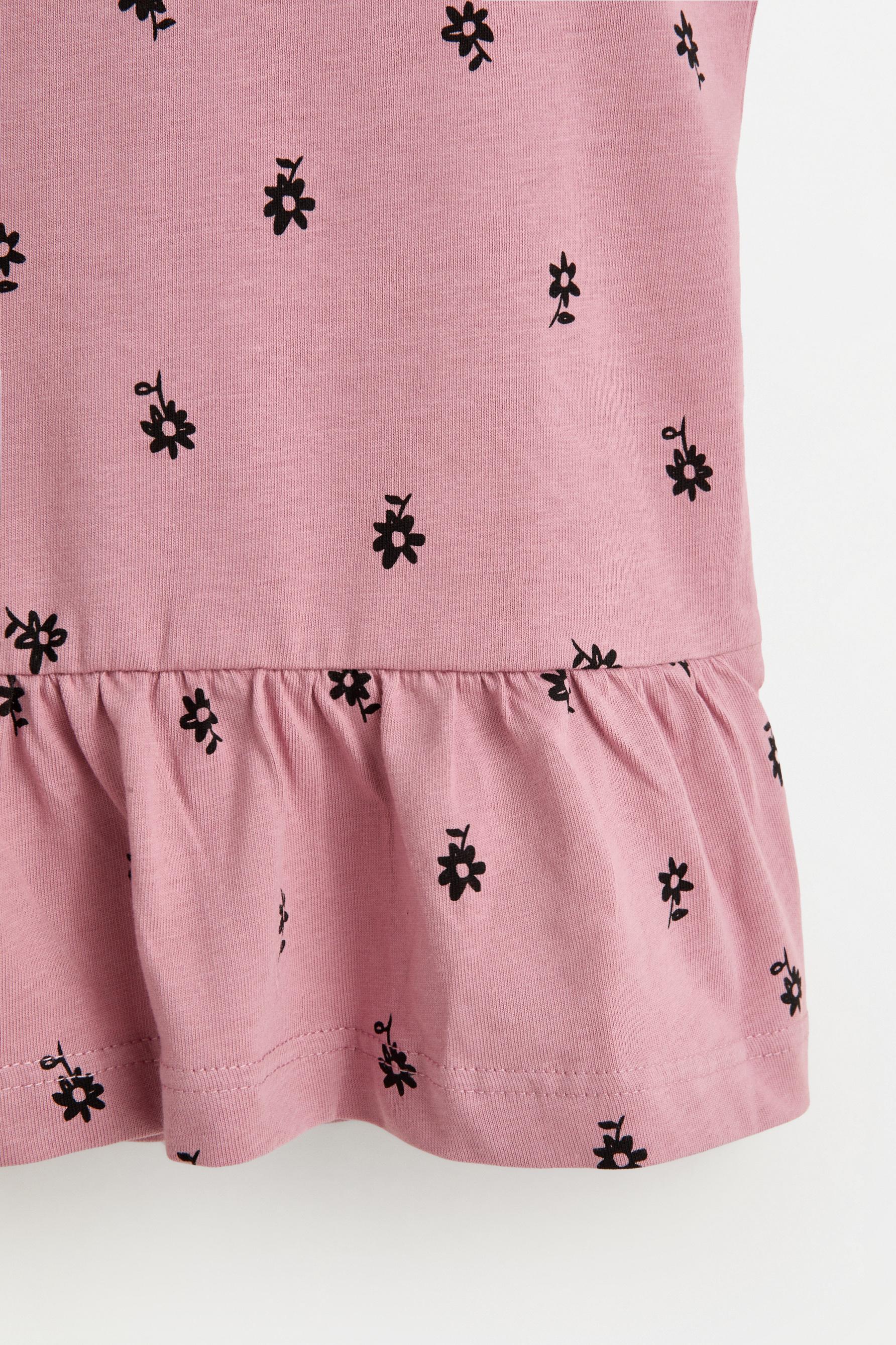 Printed peplum sleeveless t-shirt — PALE PINK