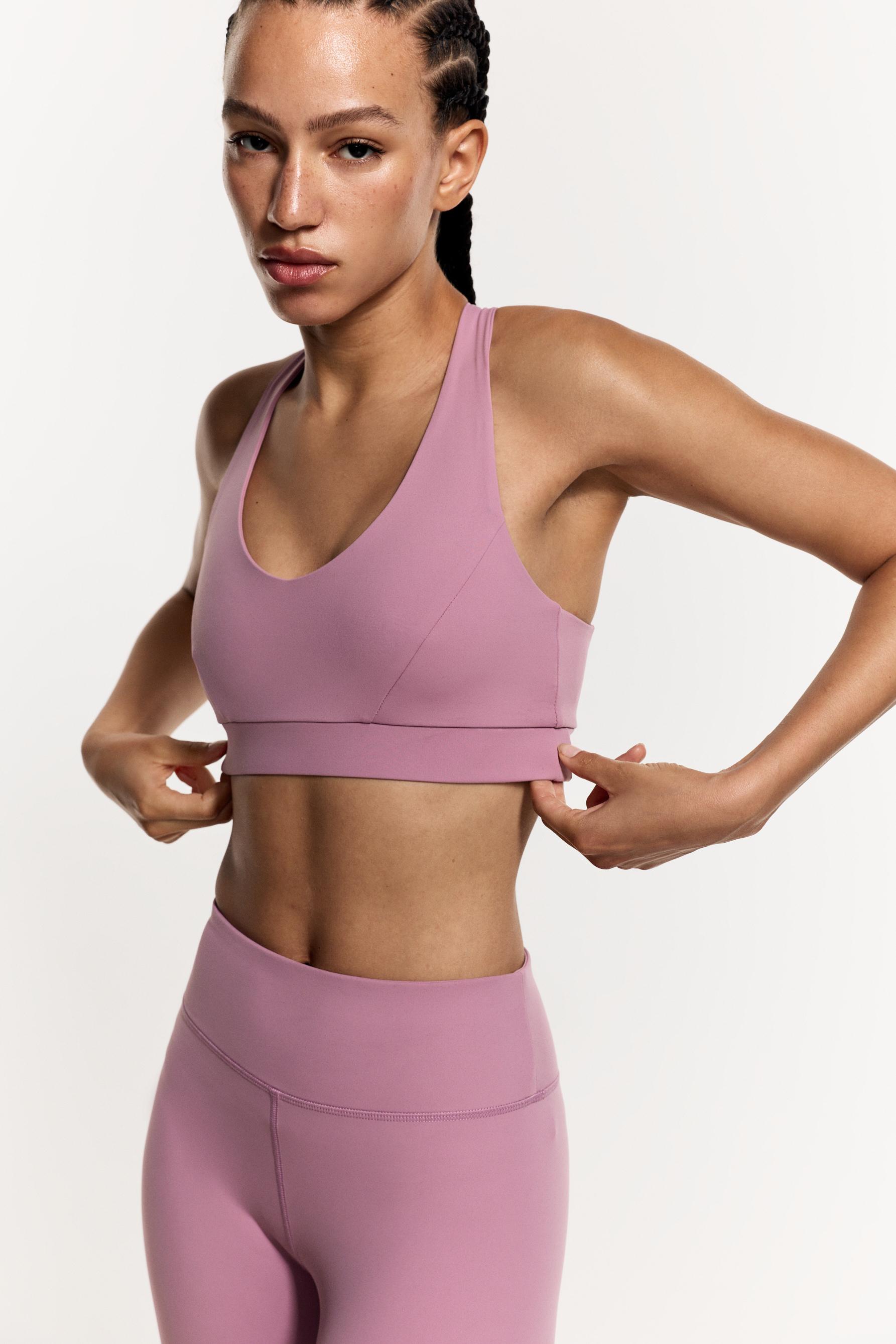 Criss-cross strap sports top — PASTEL PINK