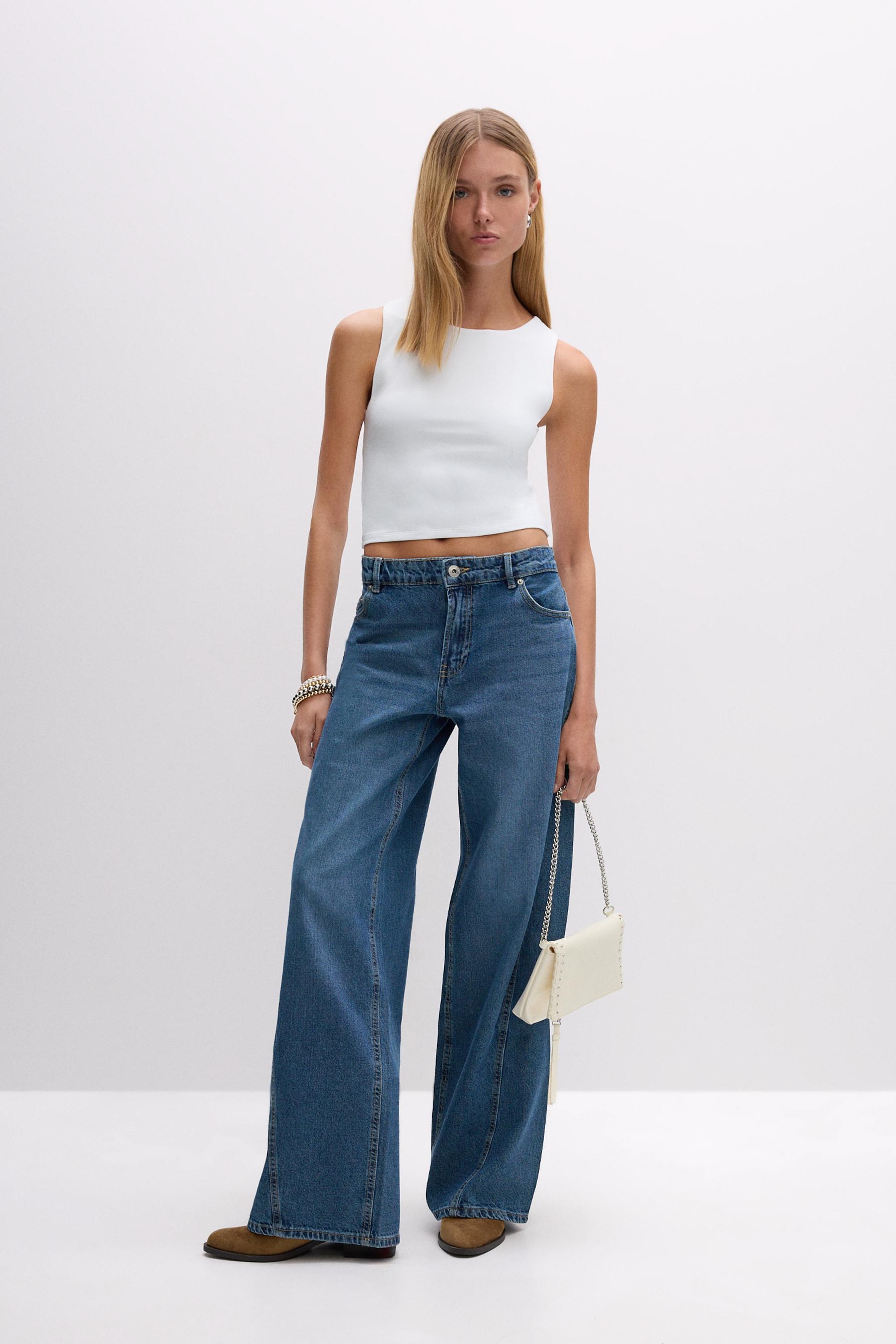 Jeans wide leg costuras giradas