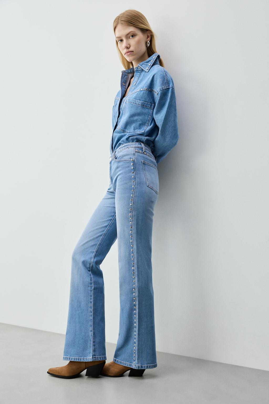 Jeans bootcut tachas
