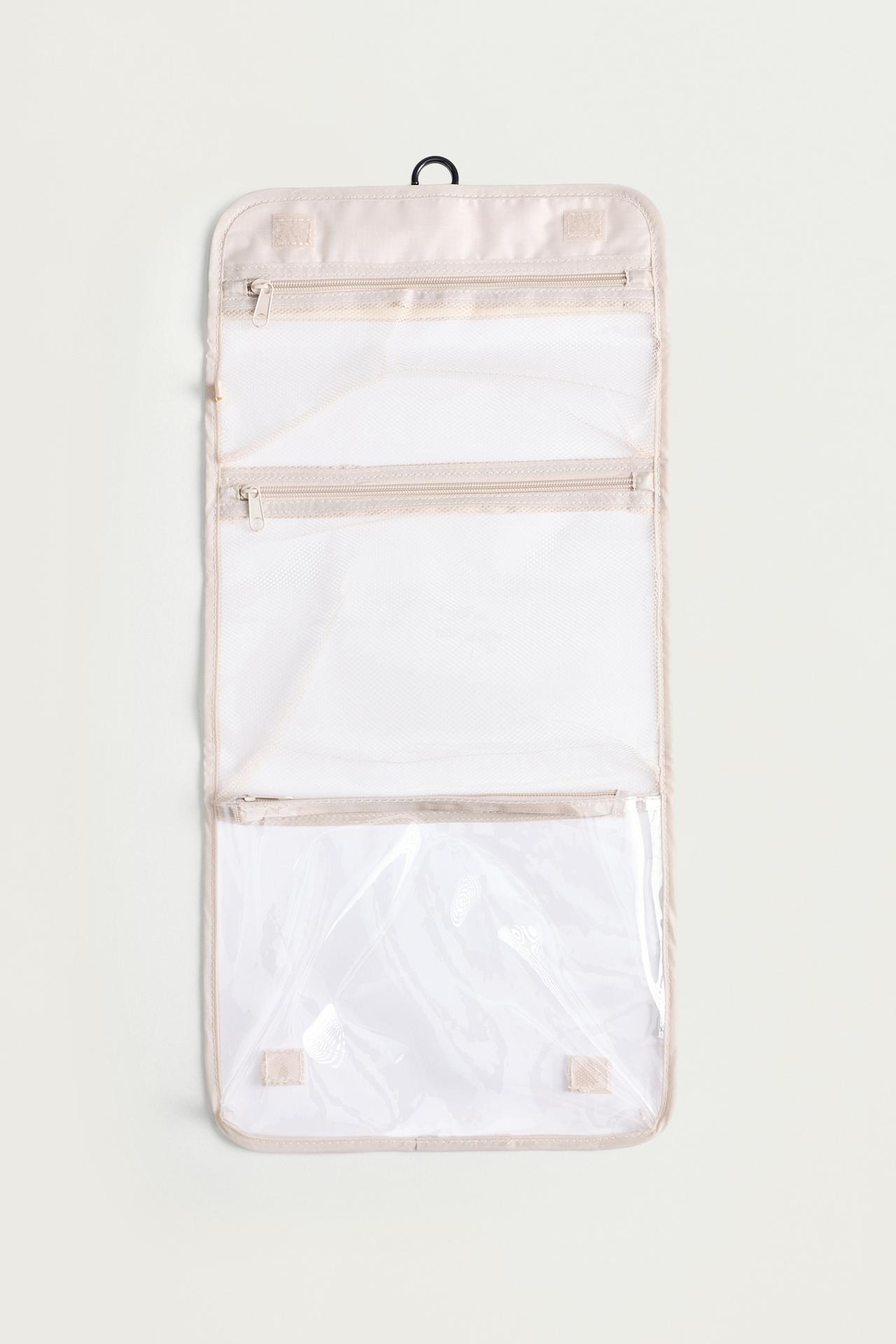 Foldable travel toiletry bag — ECRU