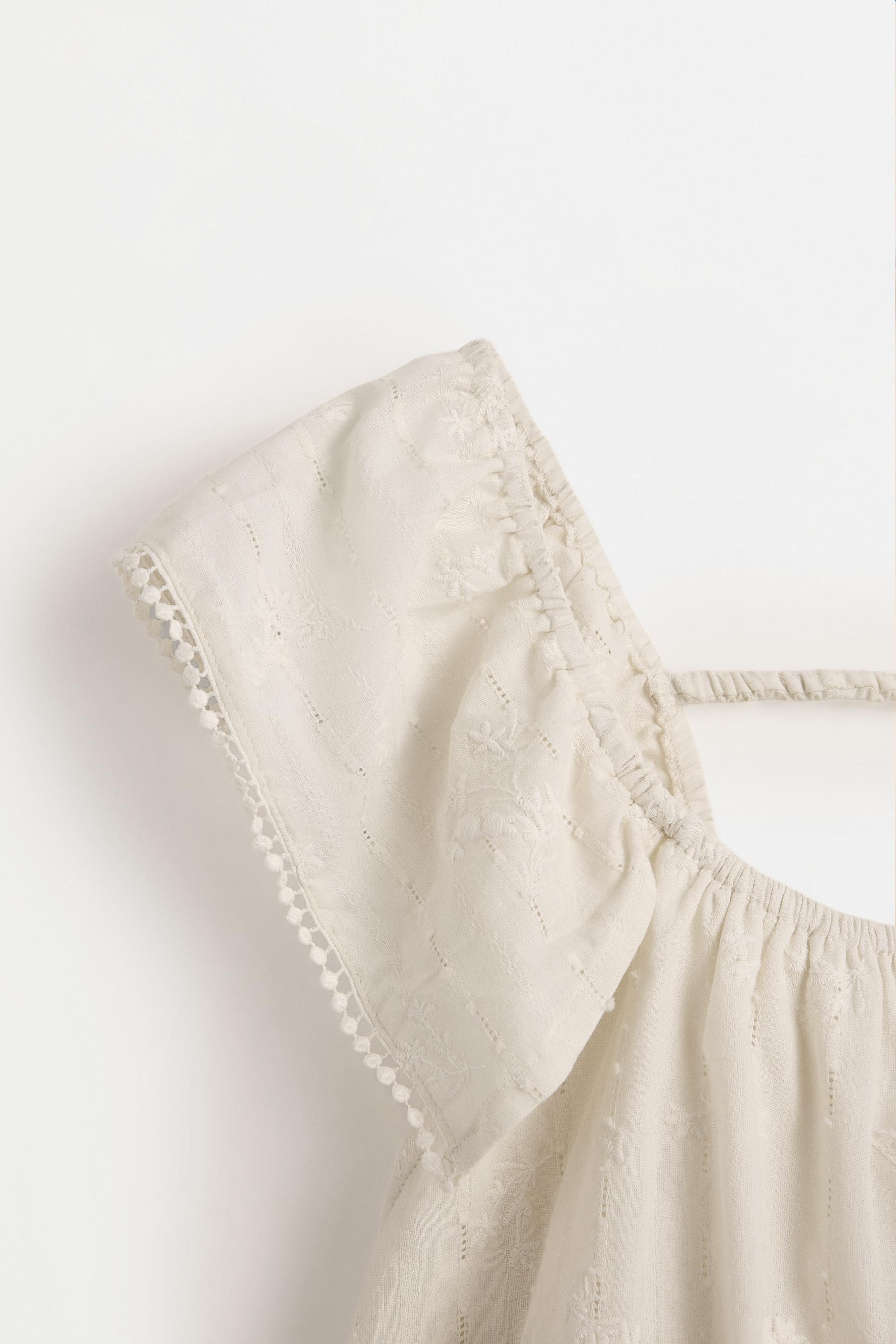 Embroidered blouse — SAND