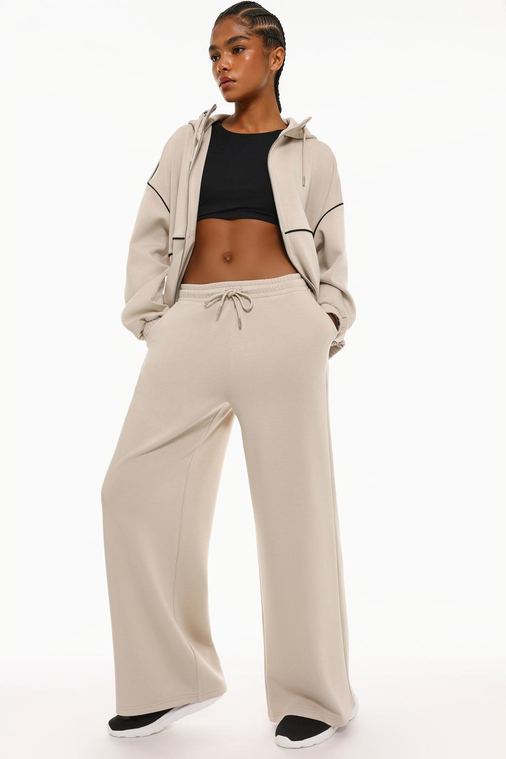 Flowing plush trousers with trims