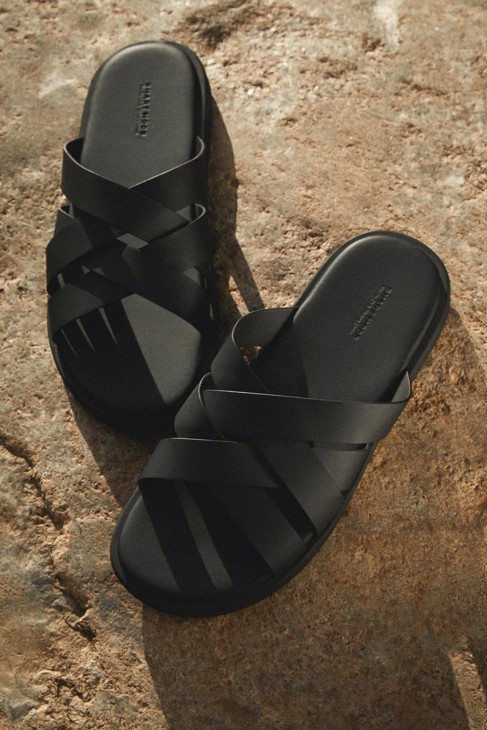 Cross-strap sandals — BLACK