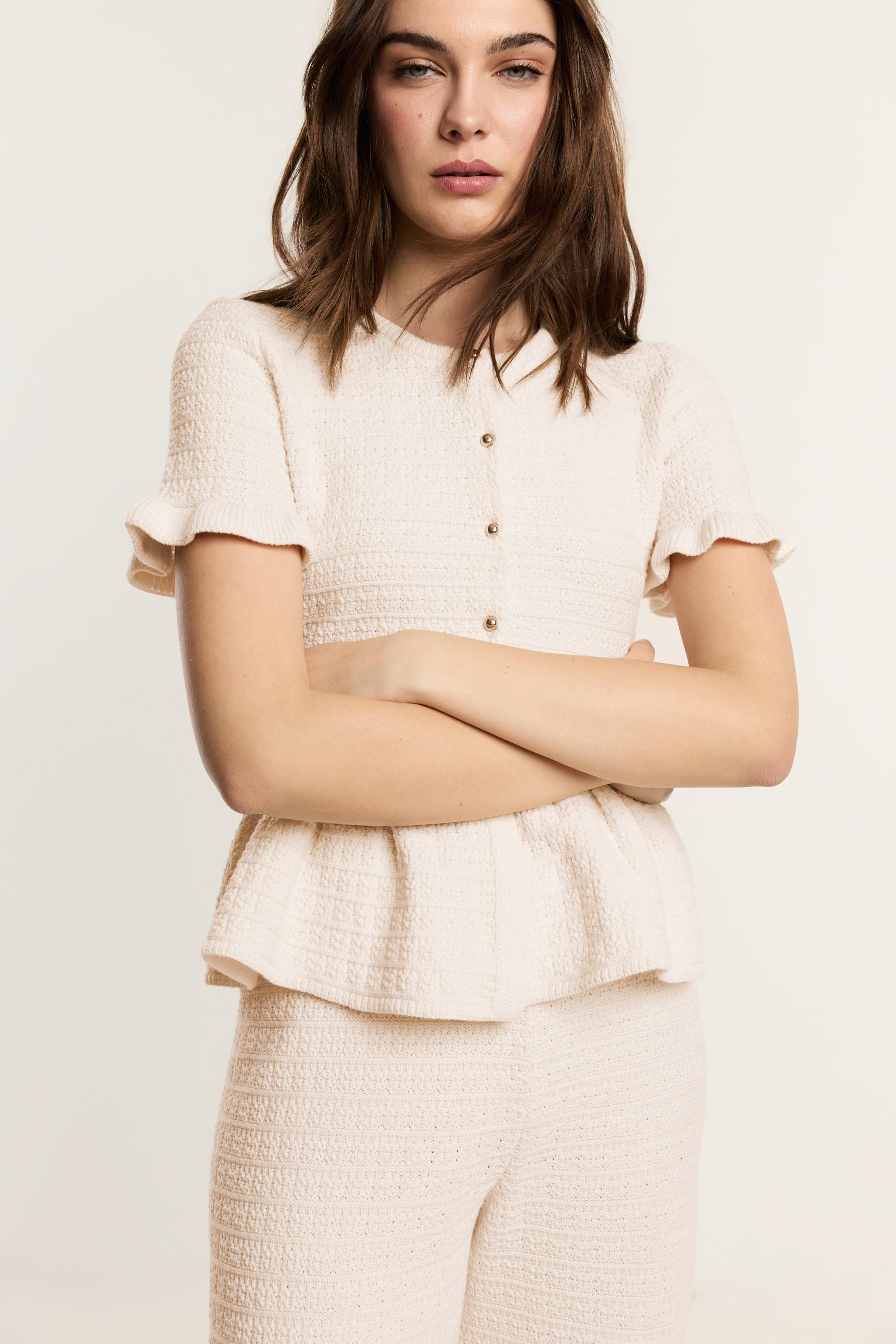 Chaqueta punto peplum