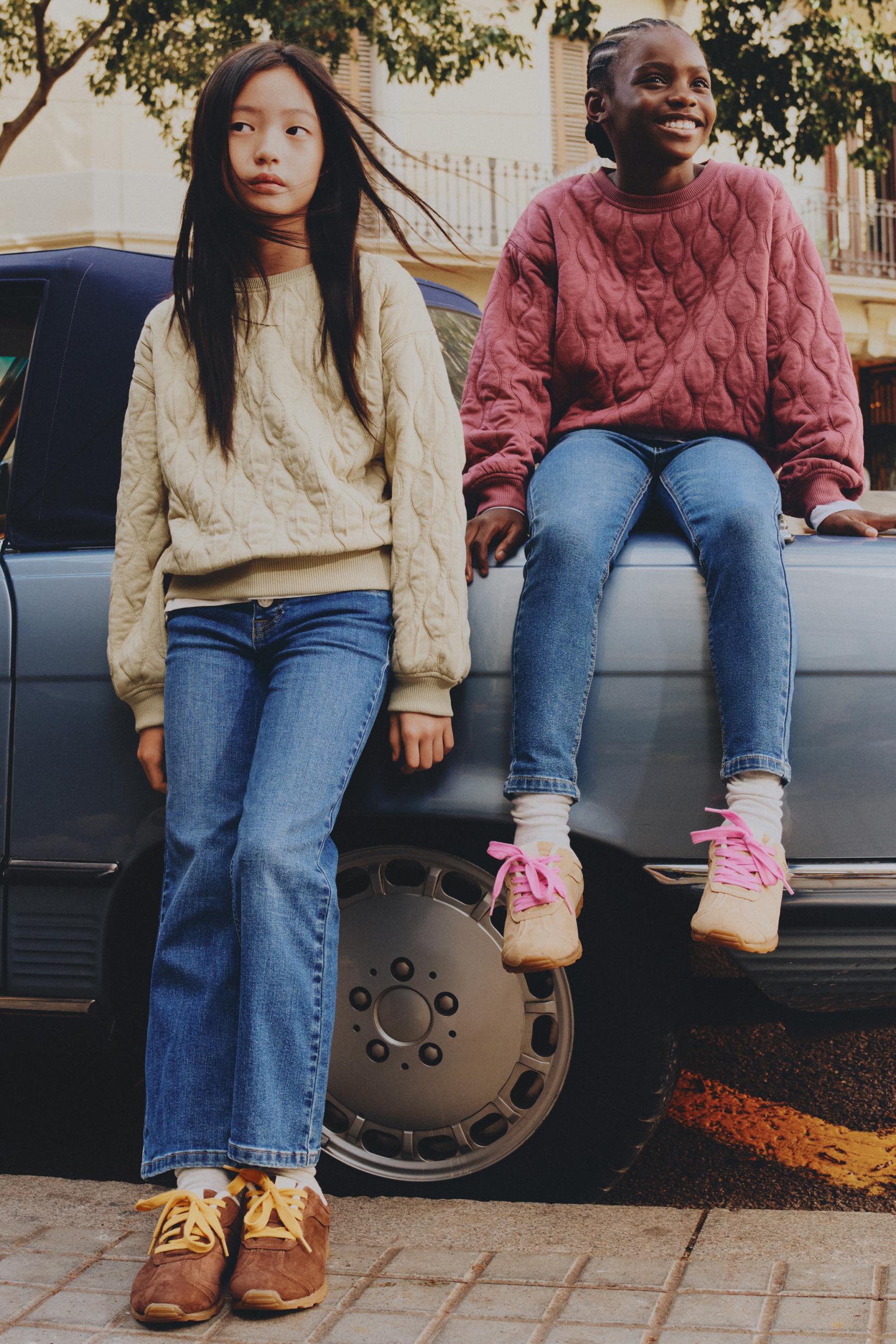 Bell bottom jeans with buttons — PALE BLUE