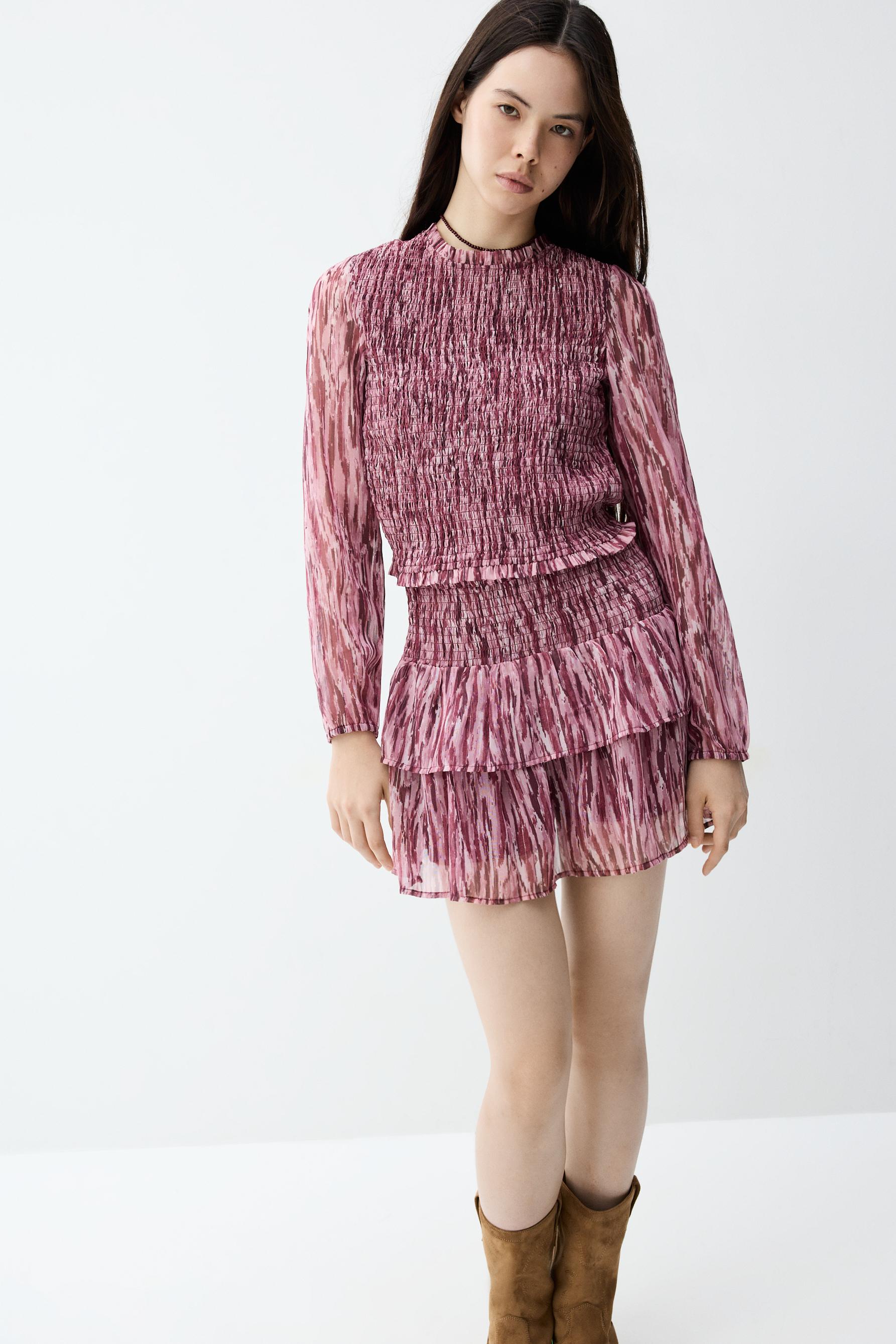 Blusa hilatura metalizada