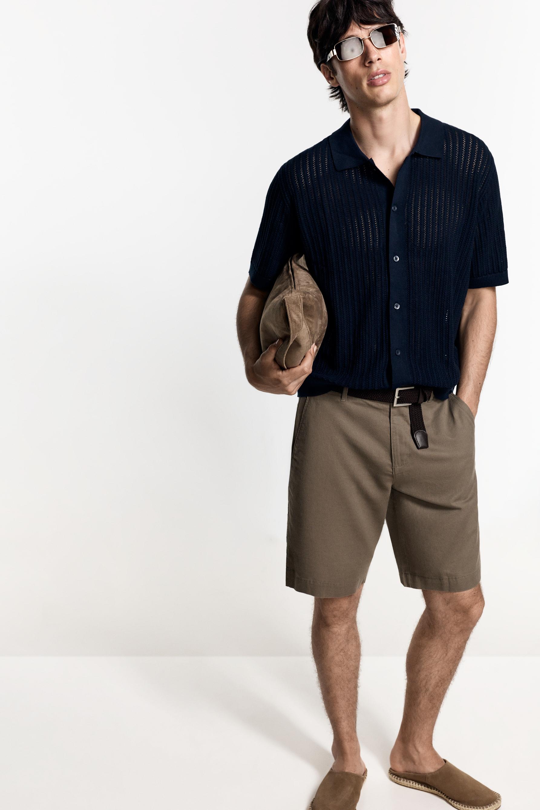 Cutwork knit polo shirt — NAVY