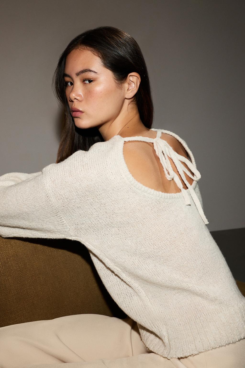 Knit sweater with back tie