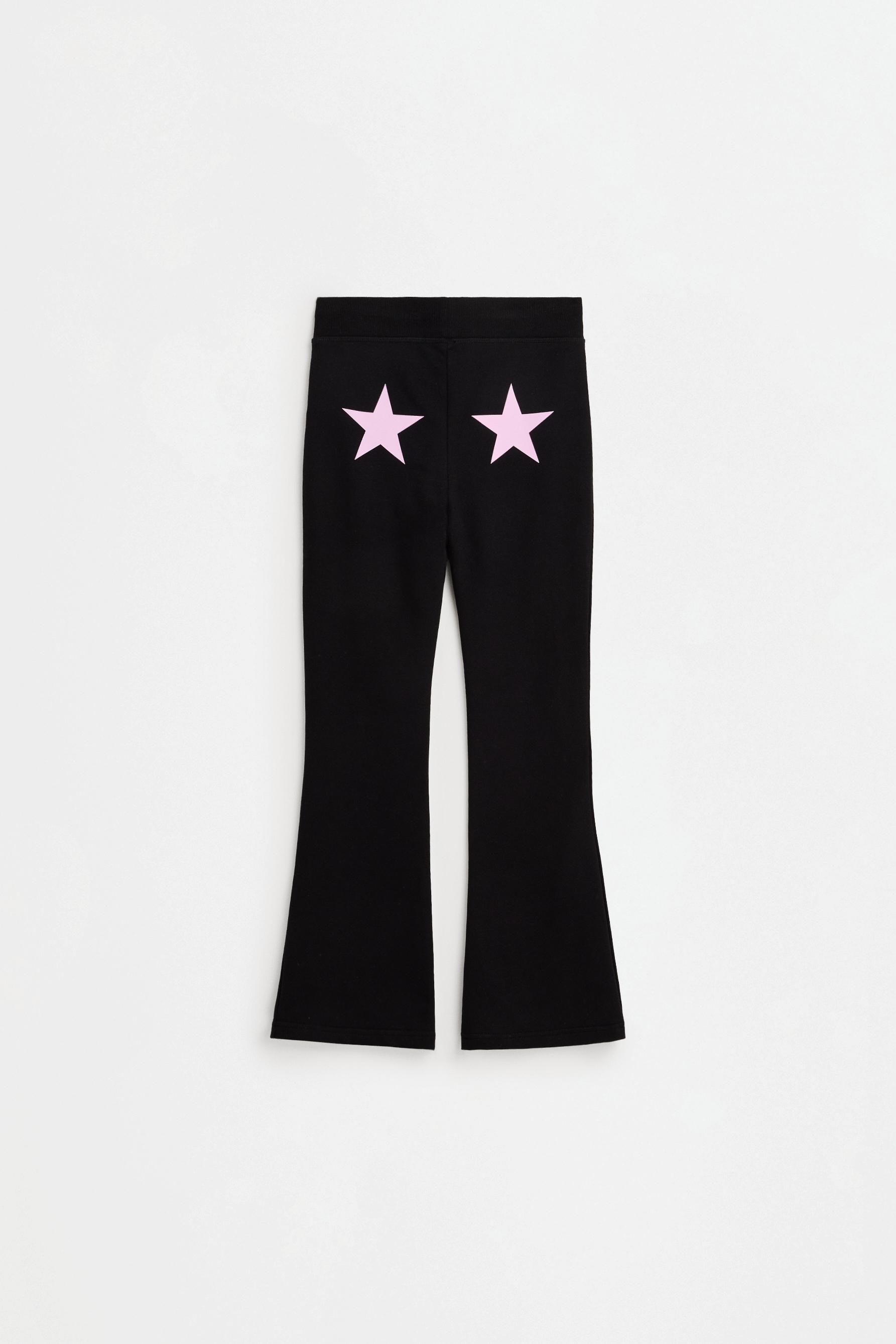 Star print fleece bell bottom leggings — BLACK