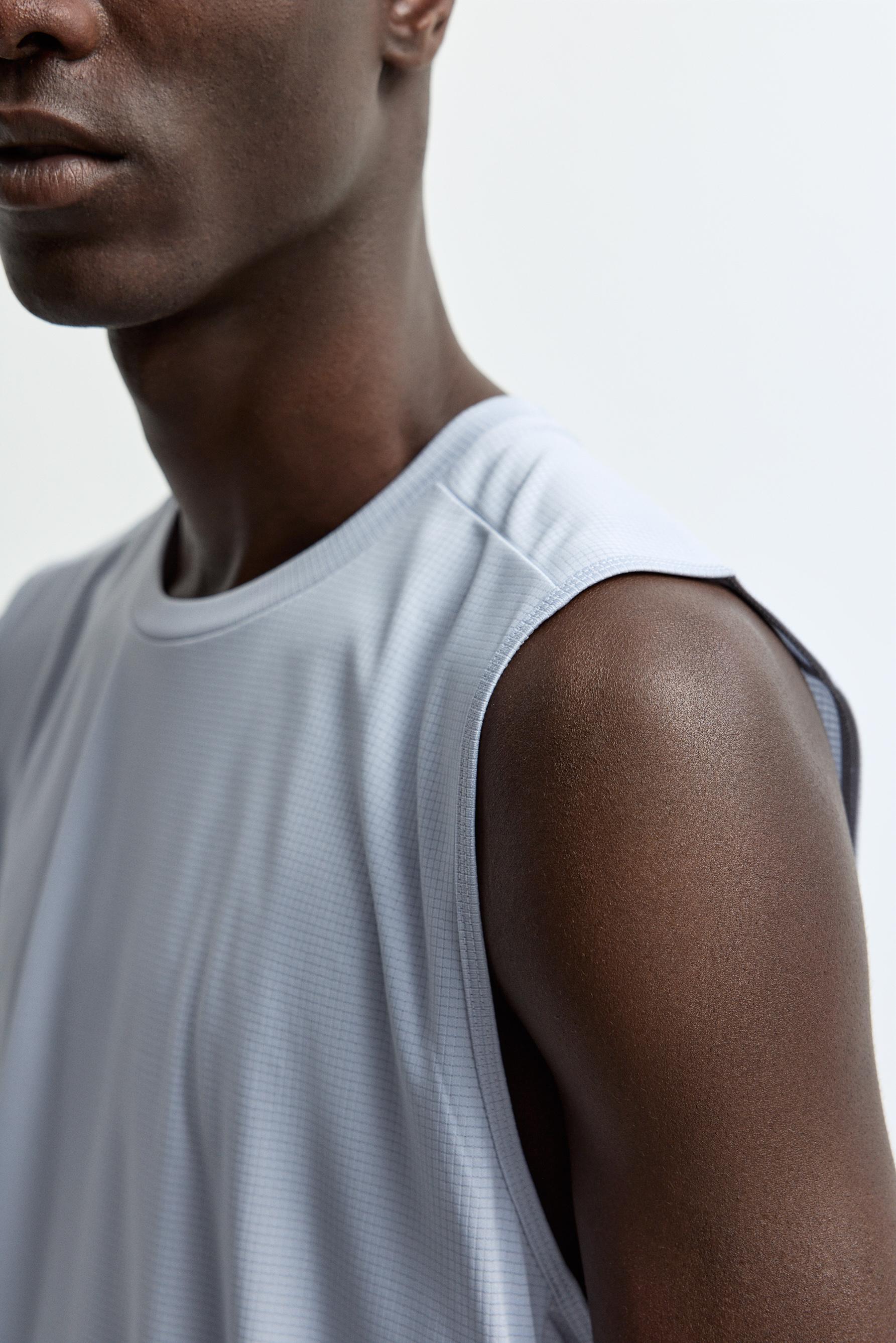 Sleeveless sports T-shirt — DARK GREY MARL