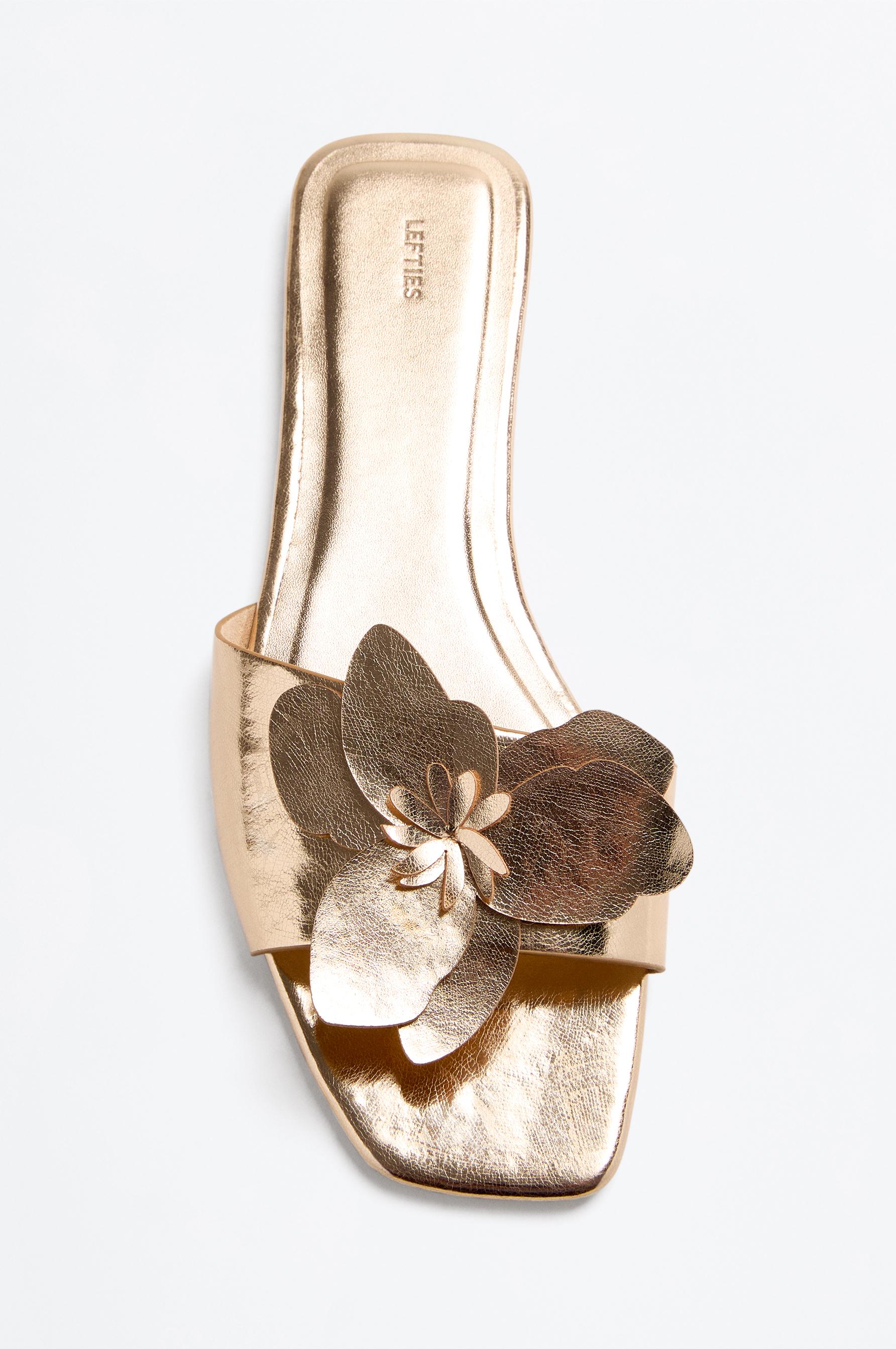 Flat slider sandals with flower detail — GOLD