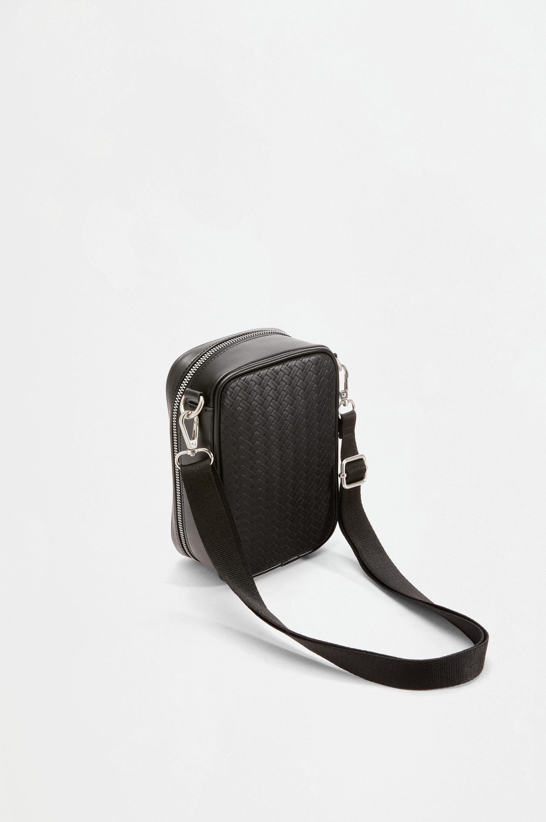 Vertical braided-effect crossbody bag — BLACK