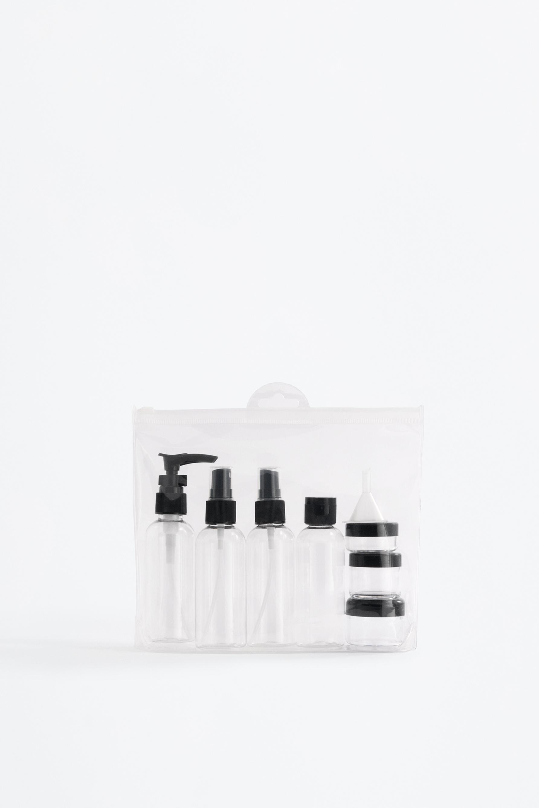 7-piece reusable travel bottle set — BLACK