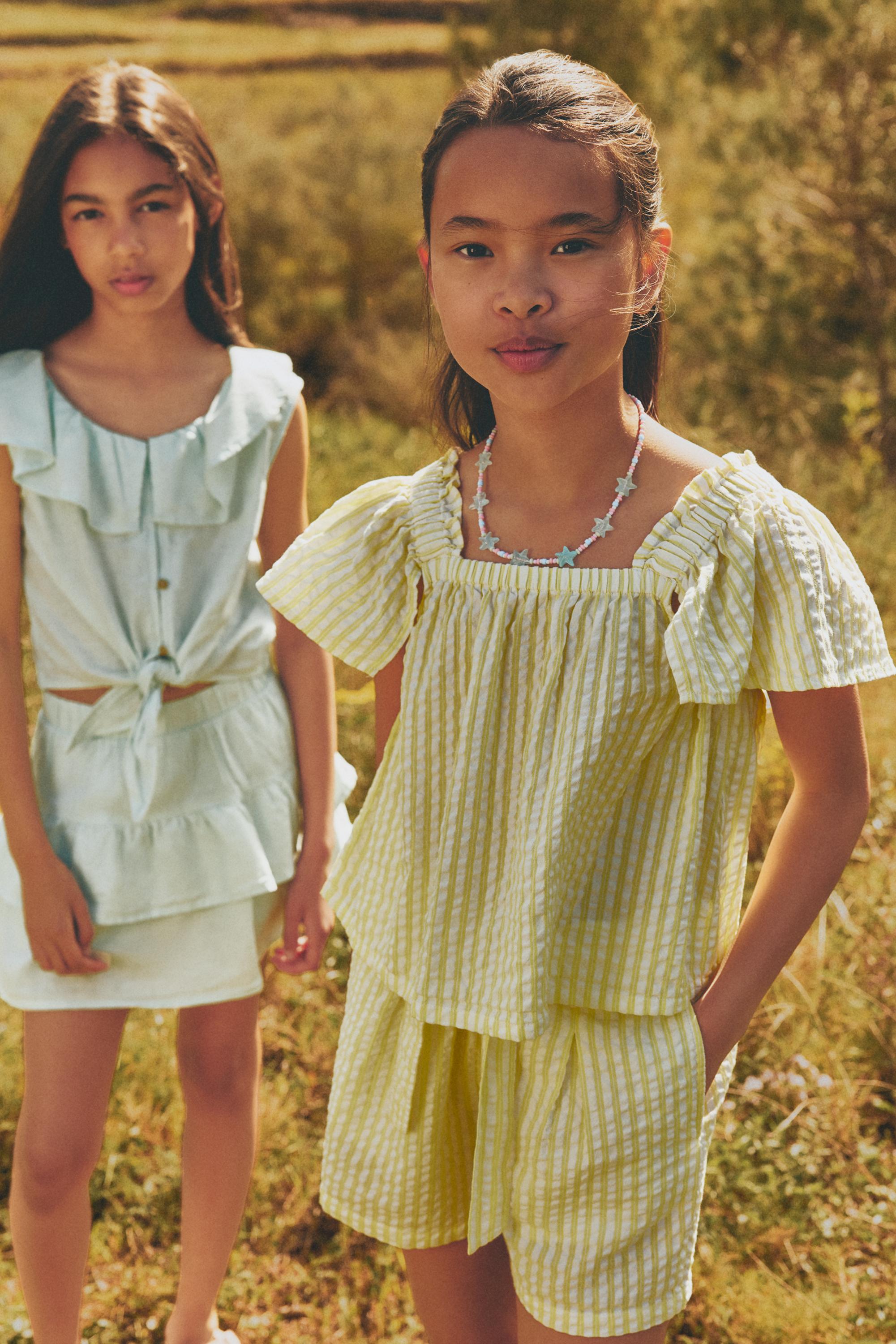 Striped seersucker shorts — YELLOW