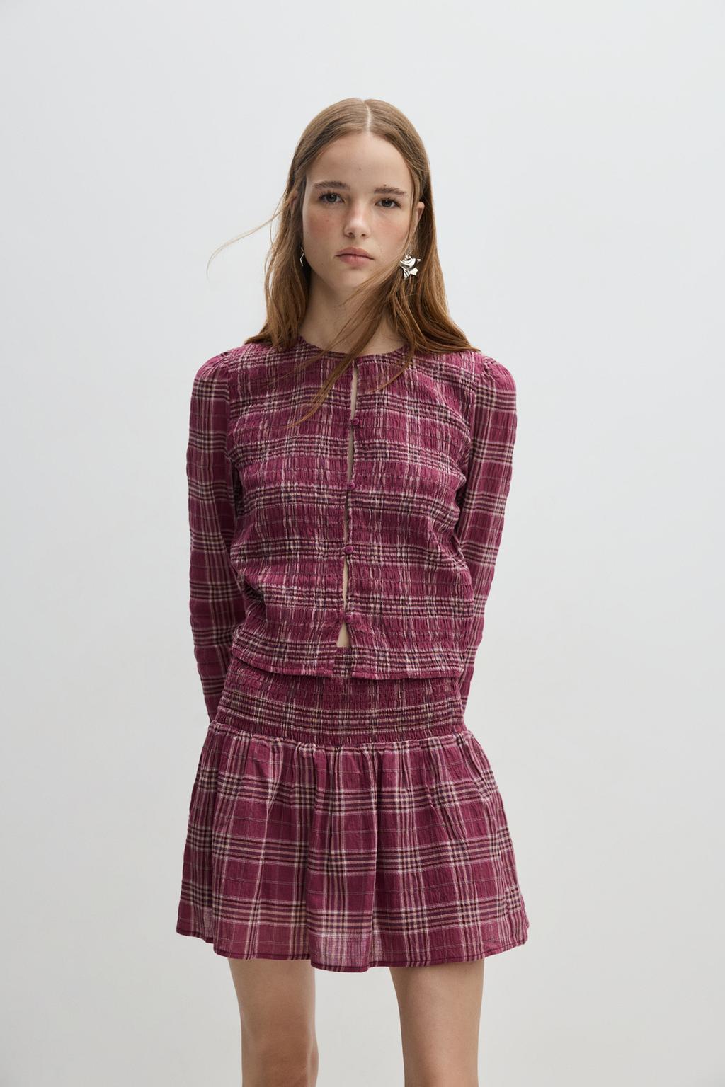 Textured blouse with ruffles