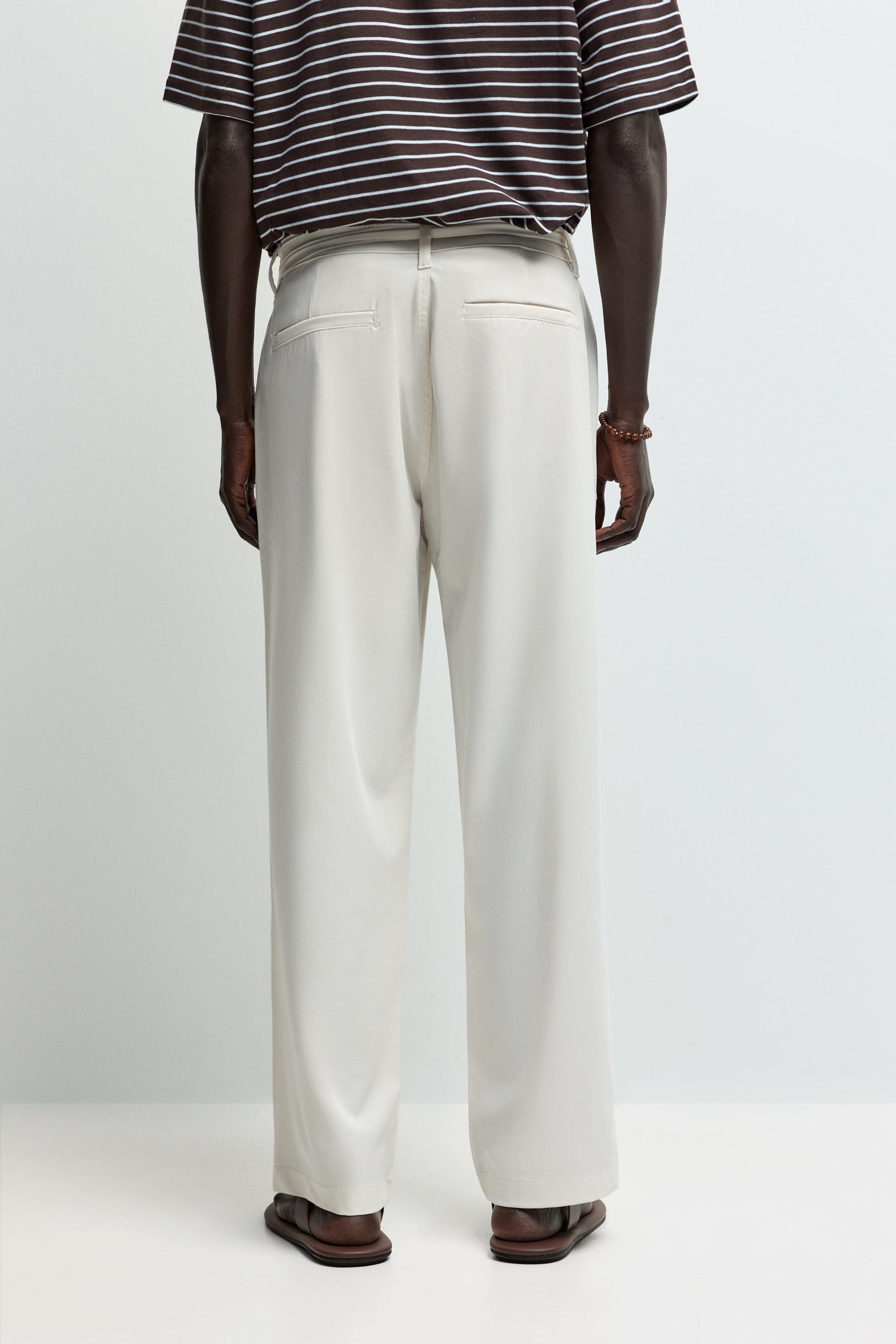 Relaxed fit chino trousers with belt — OFF WHITE
