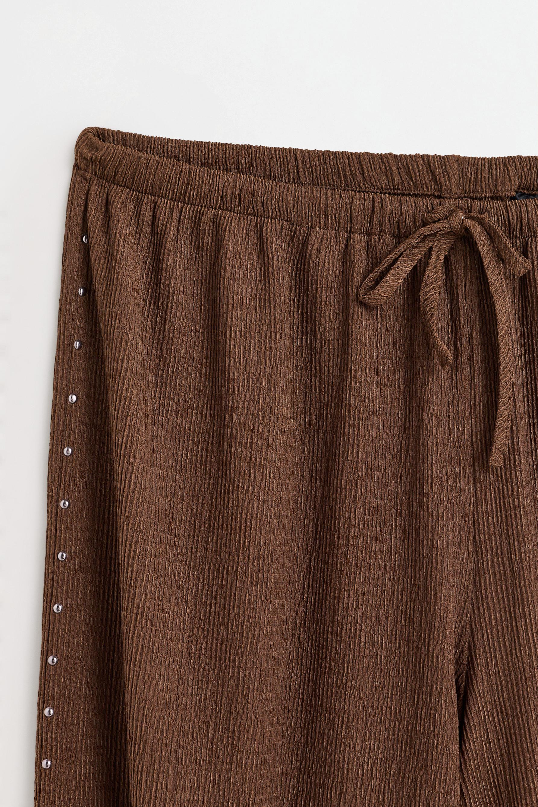 Studded joggers — CHOCOLATE