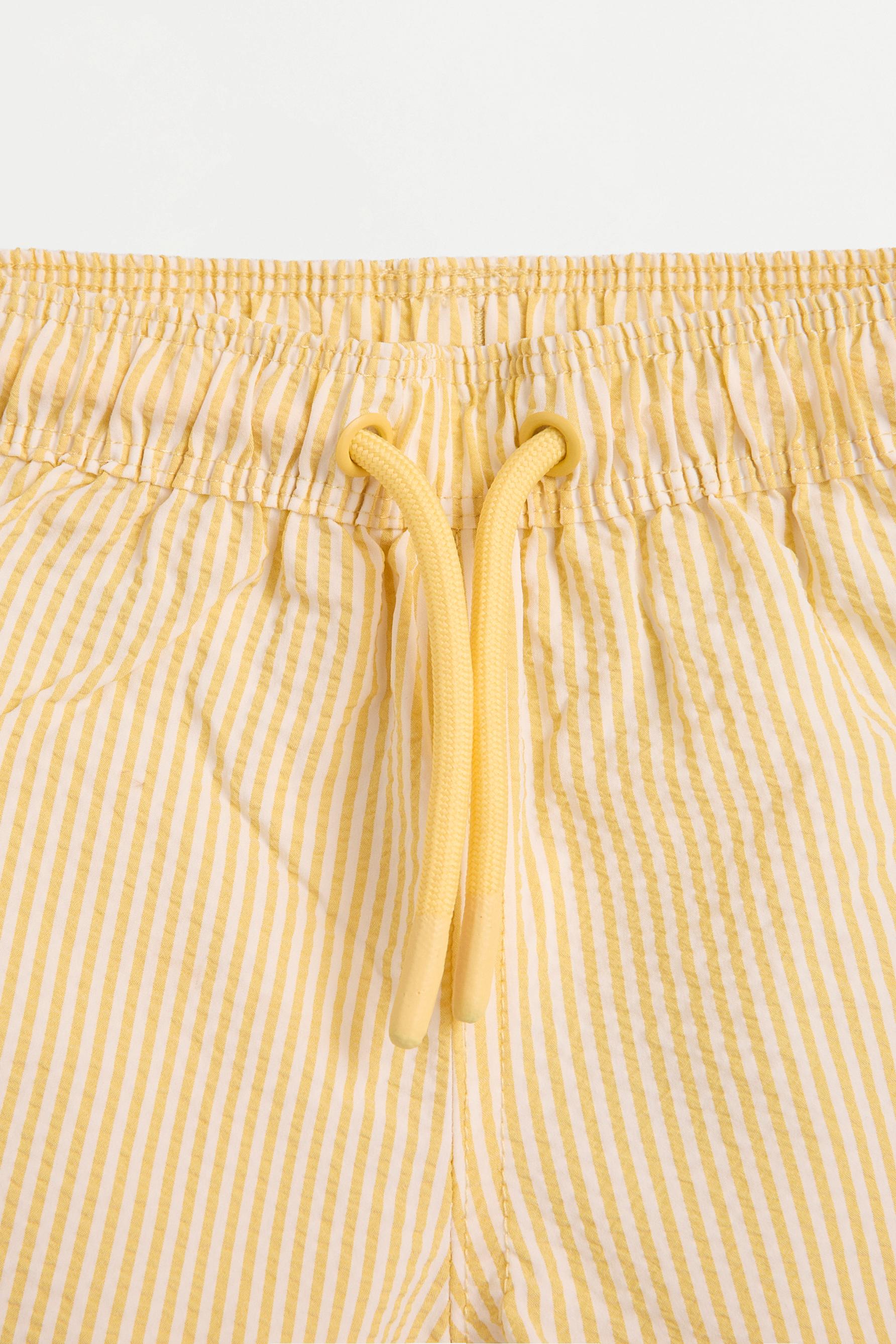Striped seersucker swim shorts — LEMON YELLOW