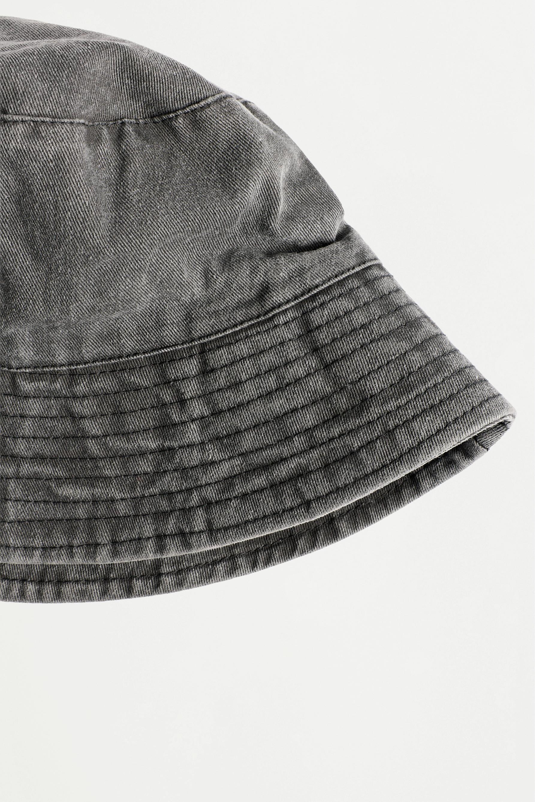 Faded-effect bucket hat — BLACK