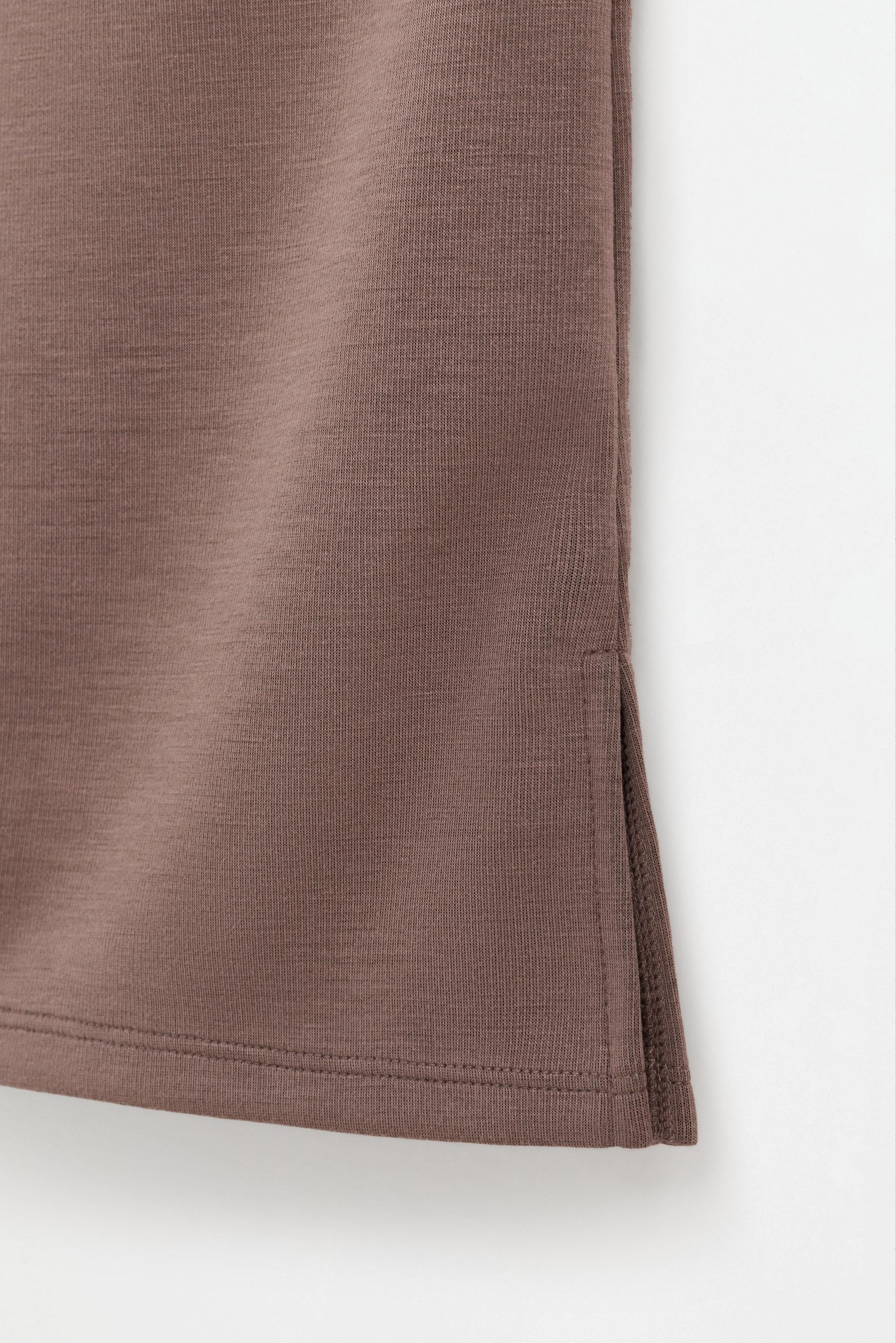 Bell bottom trousers with splits — MINK