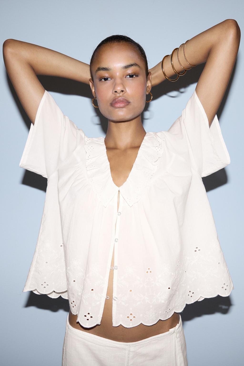 Top with Swiss embroidery