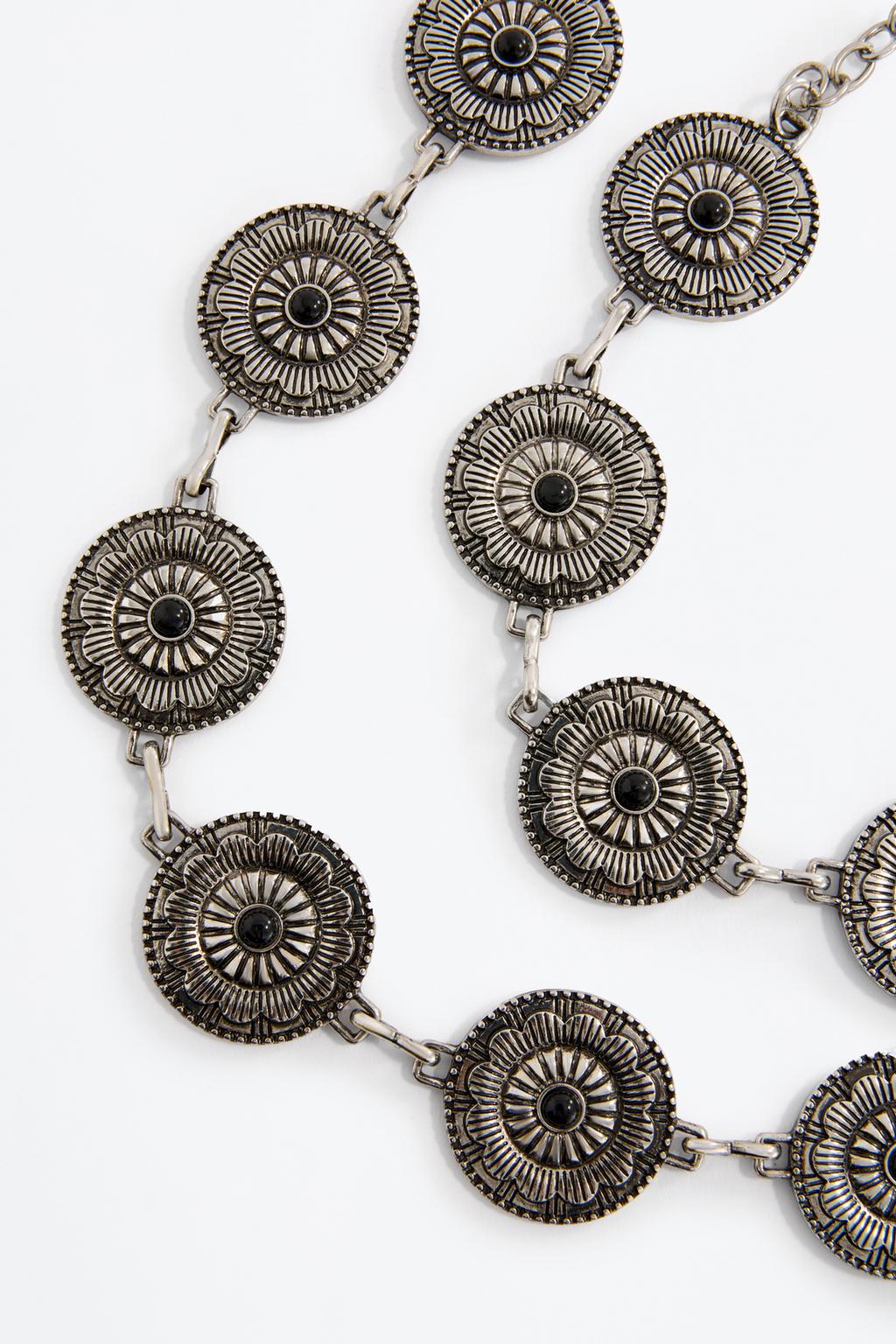 Cinturón metálico medallones