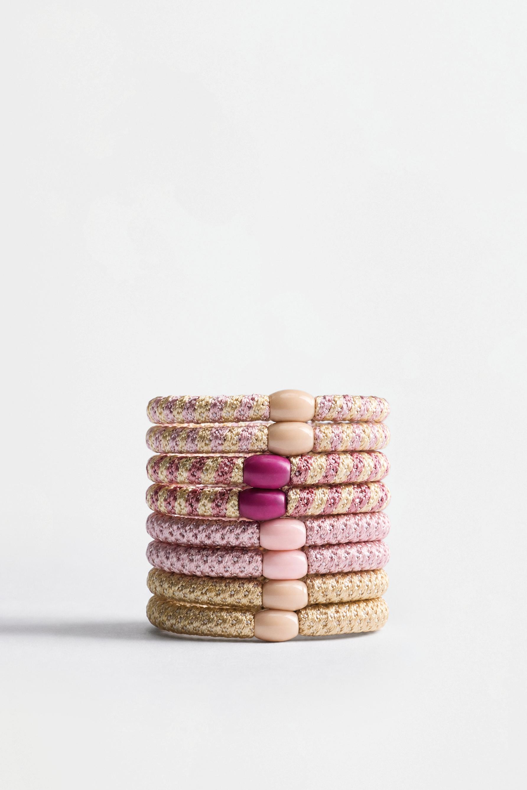 Coloured hair ties — VARIOUS