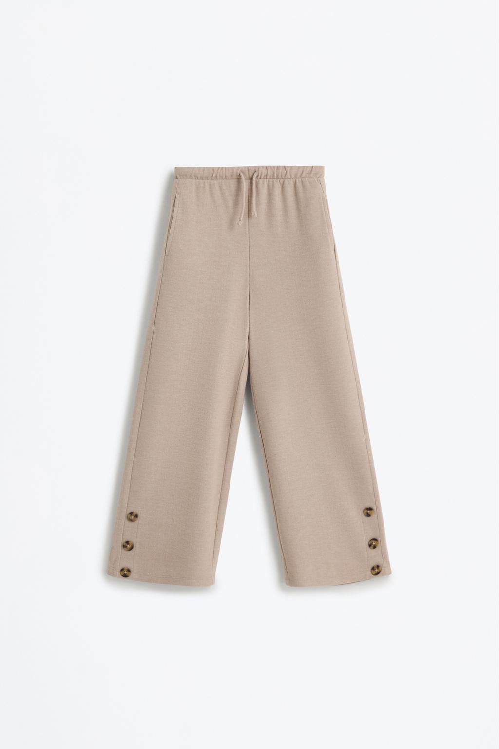 Bias cut button trousers