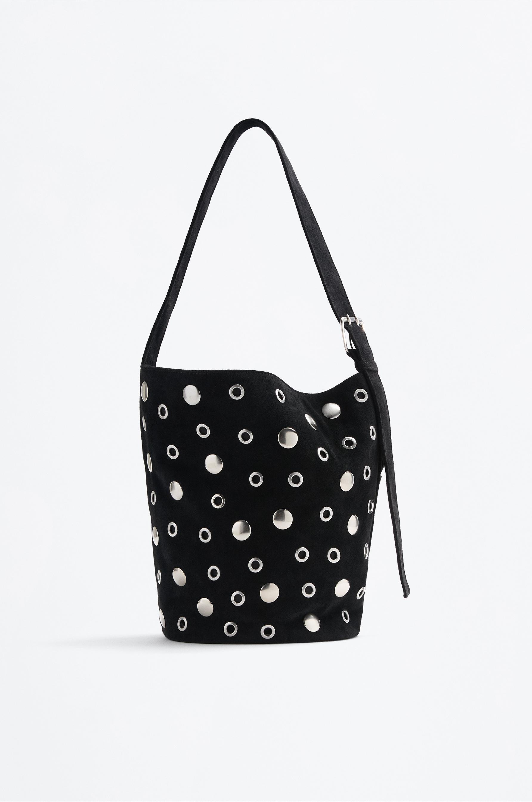 Bolso saca tachas efecto ante