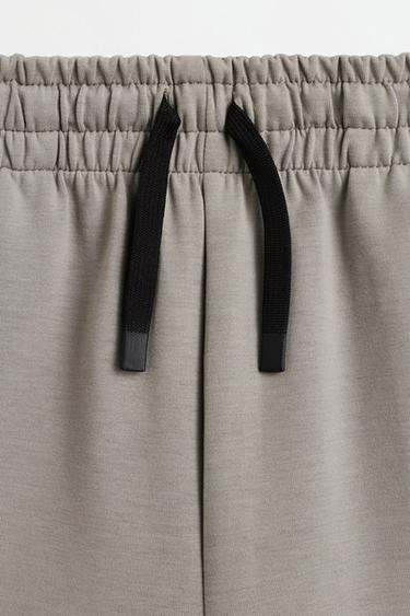Neoprene-effect trousers — PALE KHAKI 3