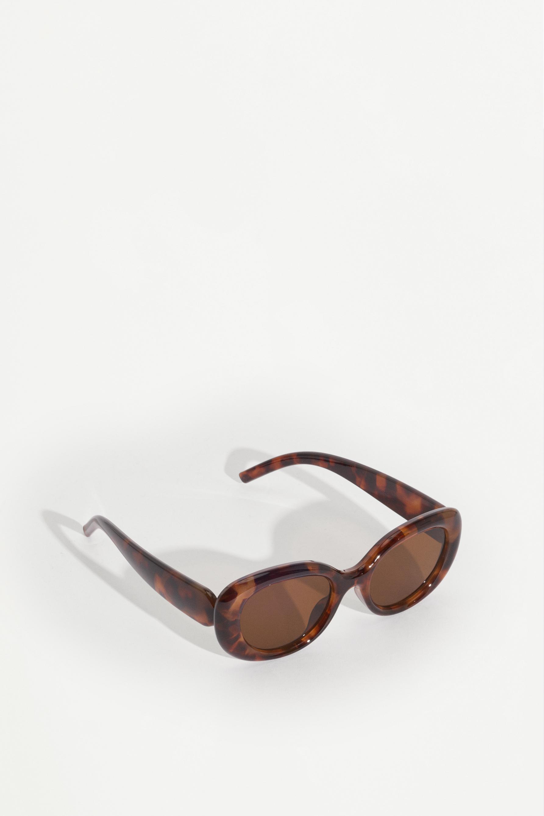 Oval tortoiseshell-effect glasses — TORTOISESHELL