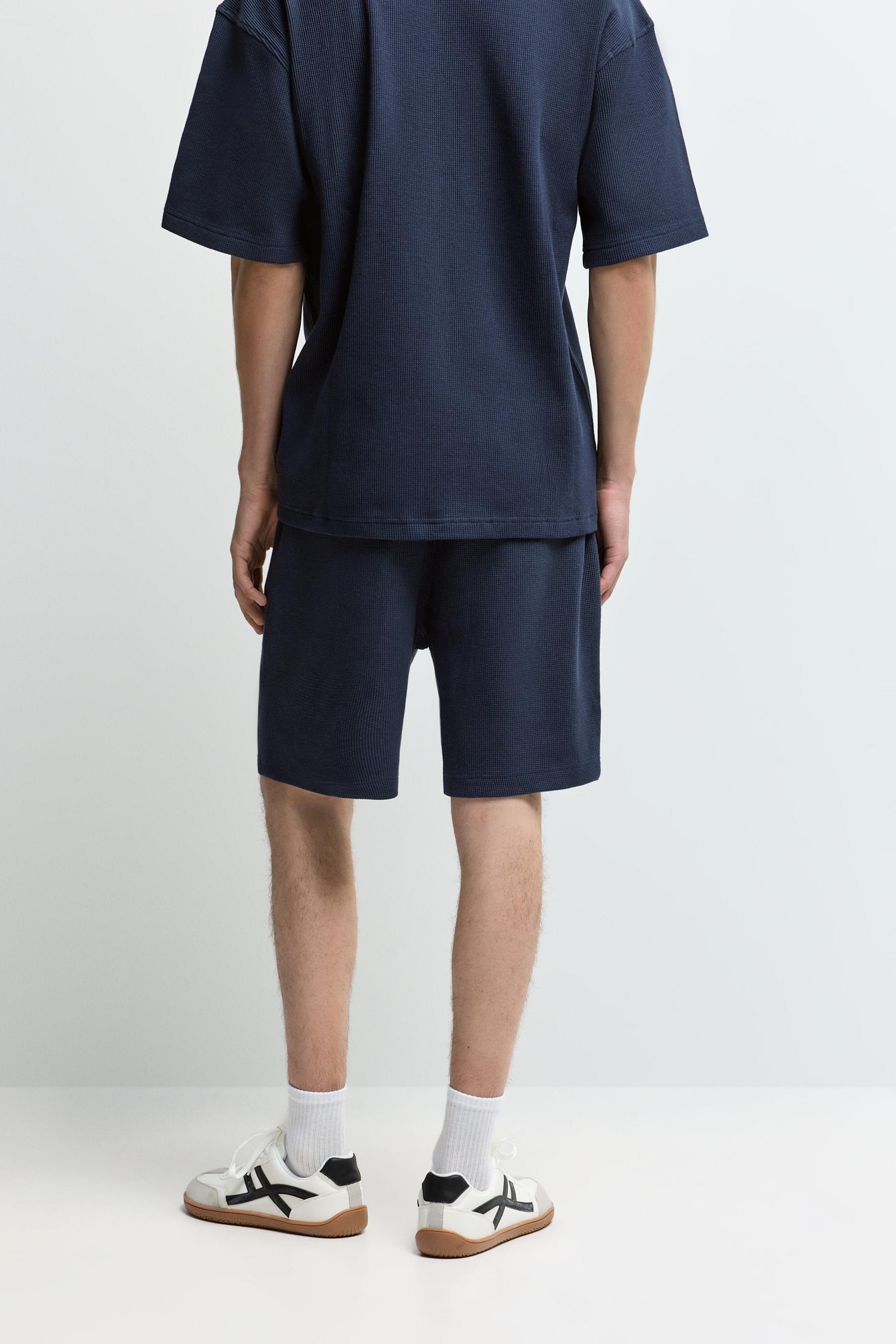 Waffle-knit textured Bermuda shorts — NAVY